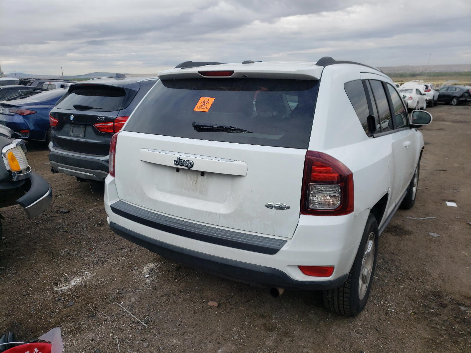 Photo 4 from auction – 2016 JEEP COMPASS LA with VIN 1C4NJCEA8GD620104