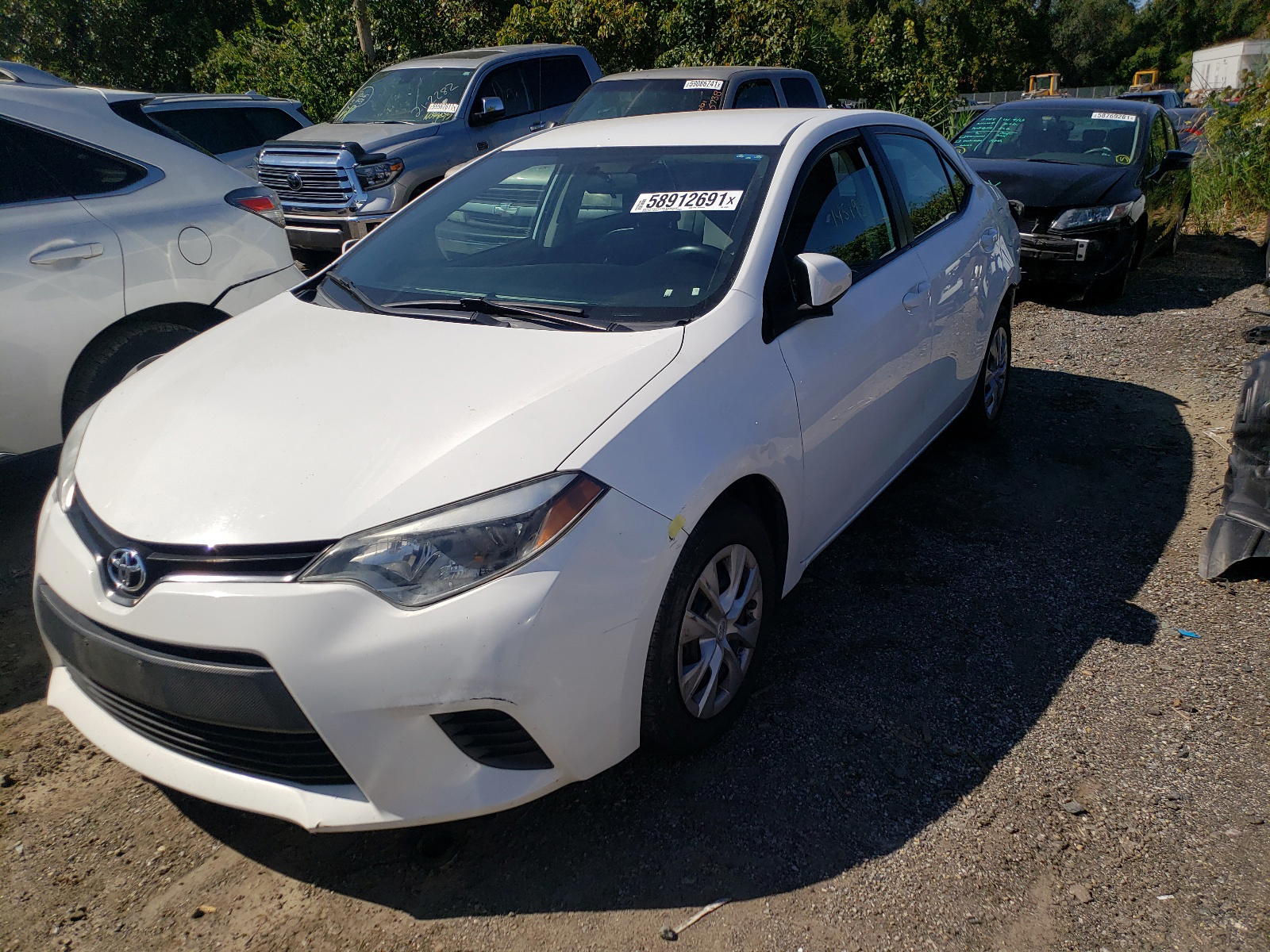 Photo 2 from auction – 2015 TOYOTA COROLLA L with VIN 2T1BURHE7FC250271