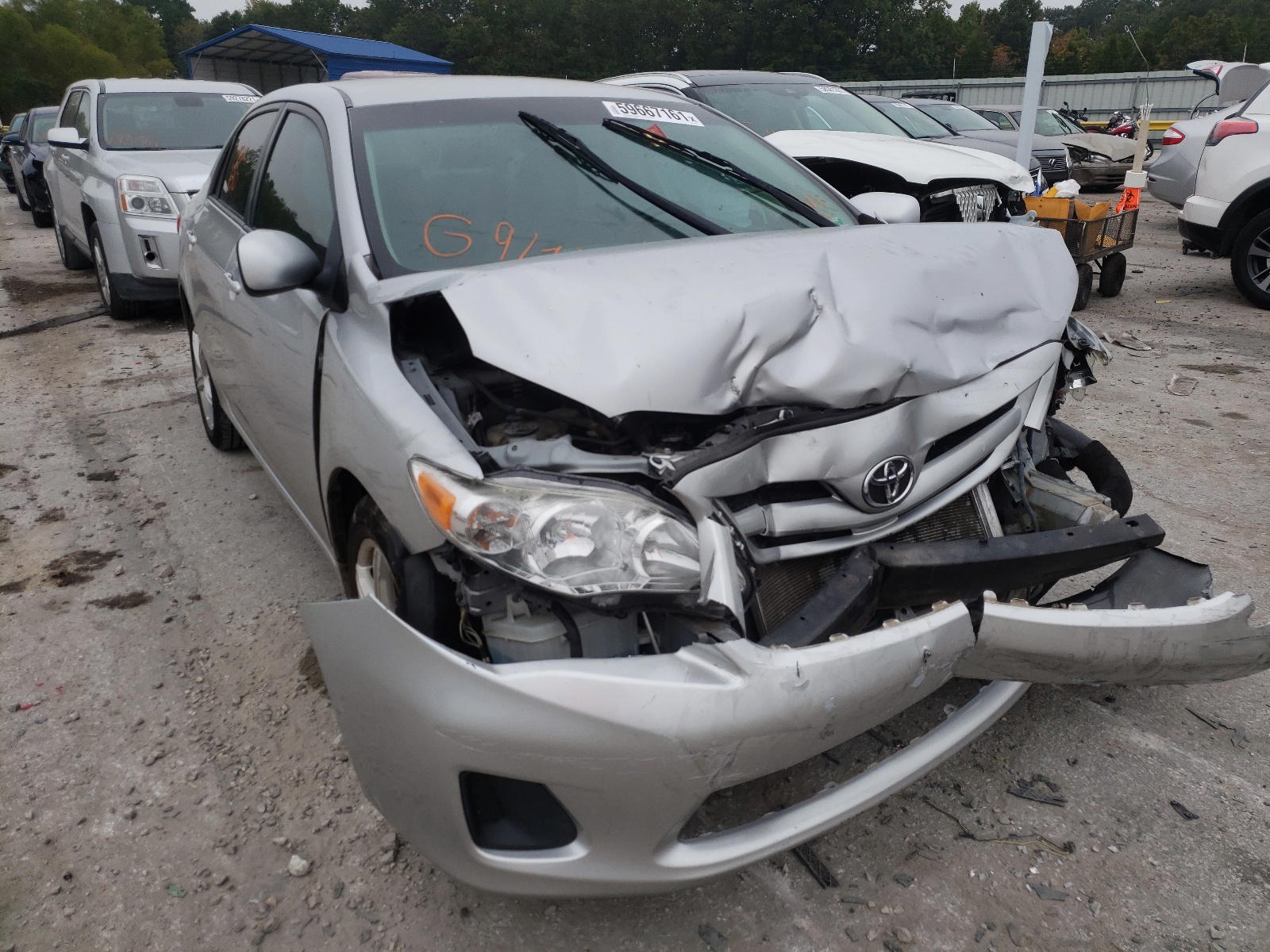 TOYOTA COROLLA BA 2011 with VIN 2T1BU4EE0BC589665 - Photo from auction
