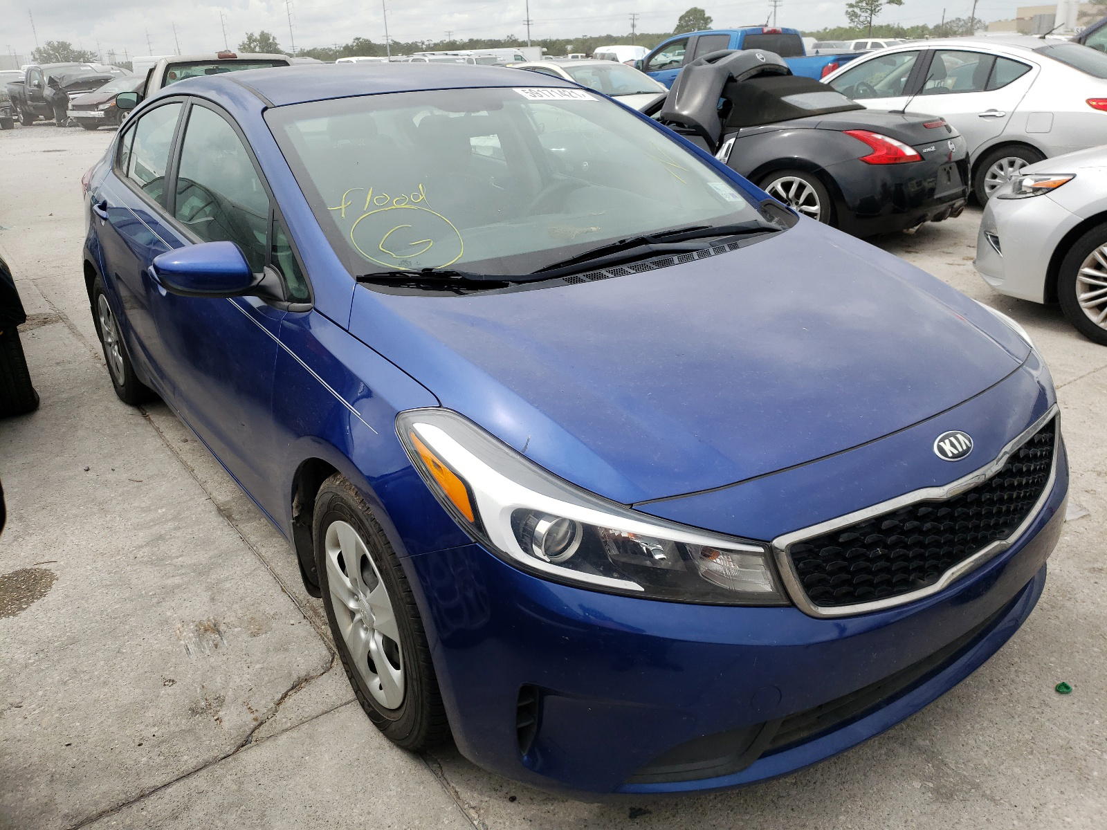 KIA FORTE LX 2017 with VIN 3KPFL4A76HE049114 - Photo from auction