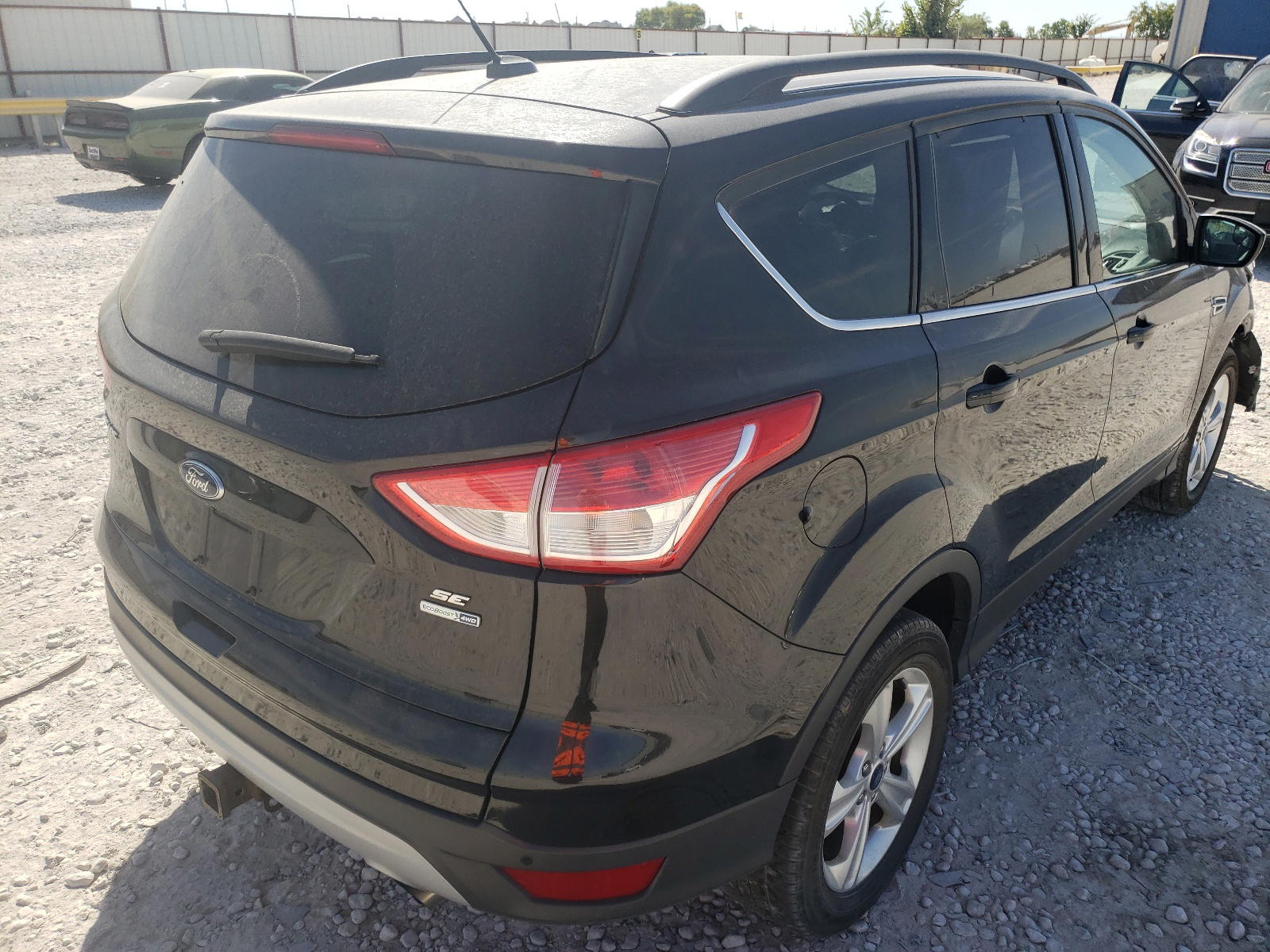 Photo 4 from auction – 2014 FORD ESCAPE SE with VIN 1FMCU9G97EUC59851