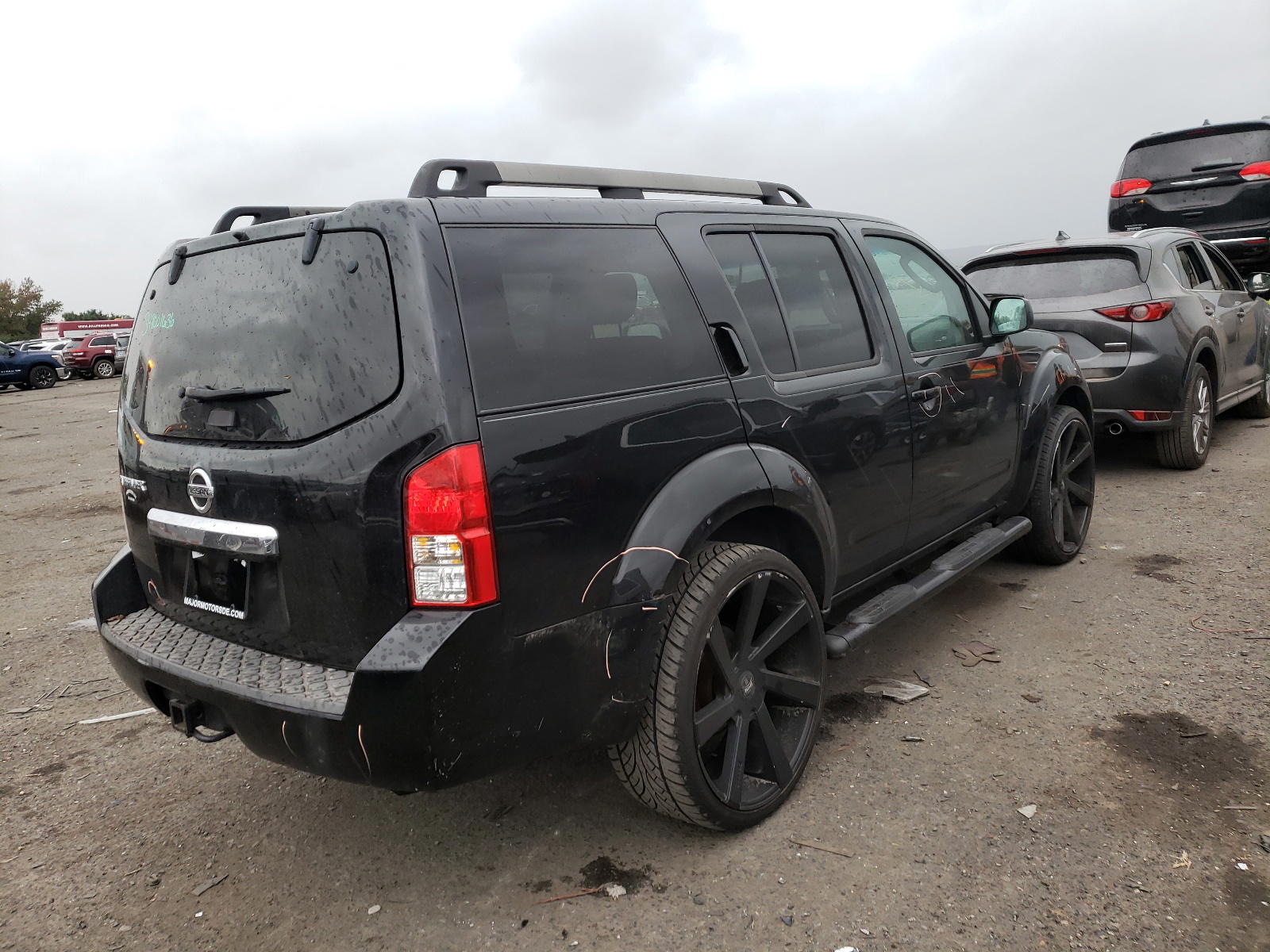 Photo 4 from auction – 2011 NISSAN PATHFINDER with VIN 5N1AR1NB7BC620559
