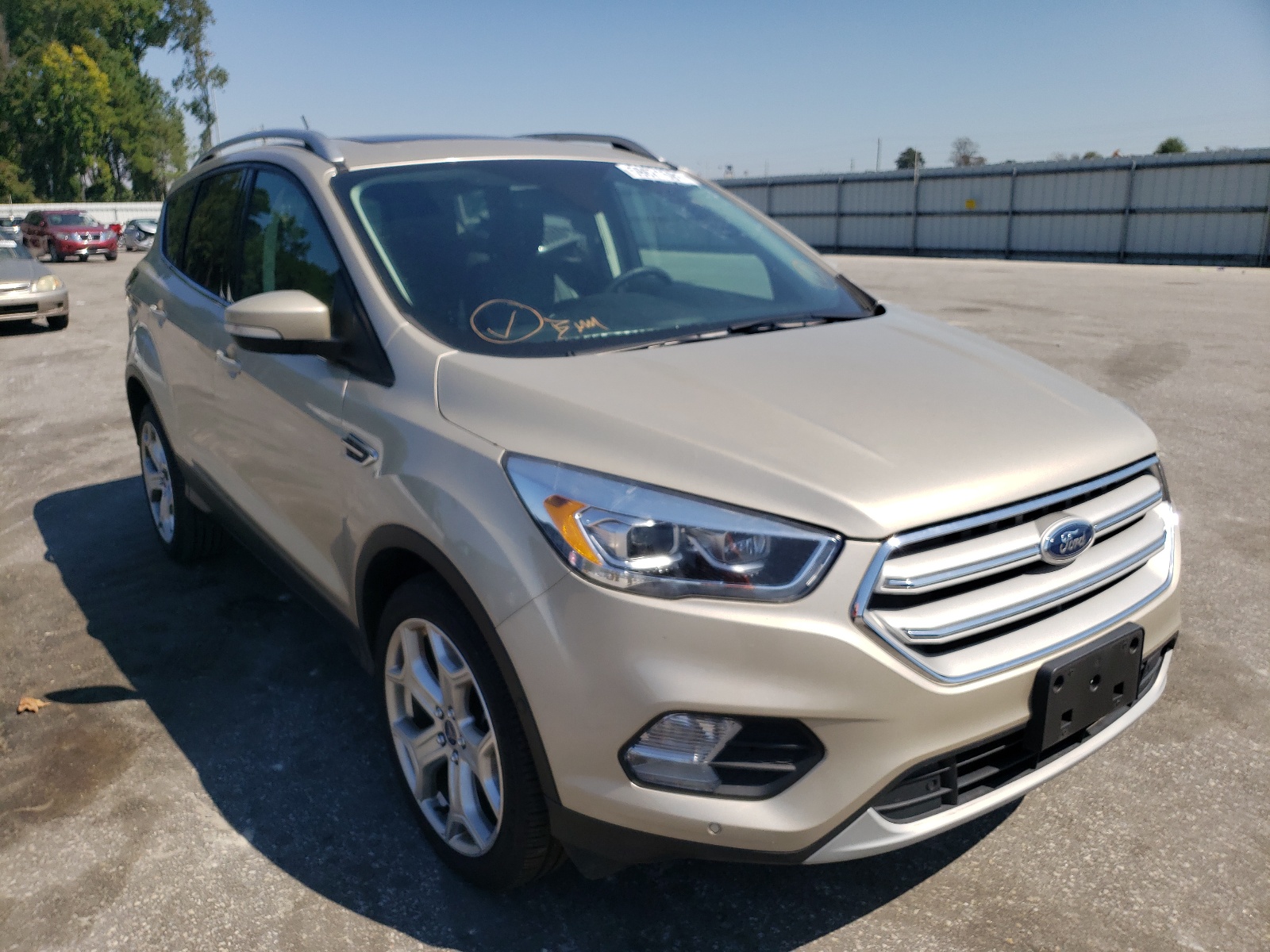 FORD ESCAPE TIT 2018 with VIN 1FMCU9J94JUA48237 - Photo from auction