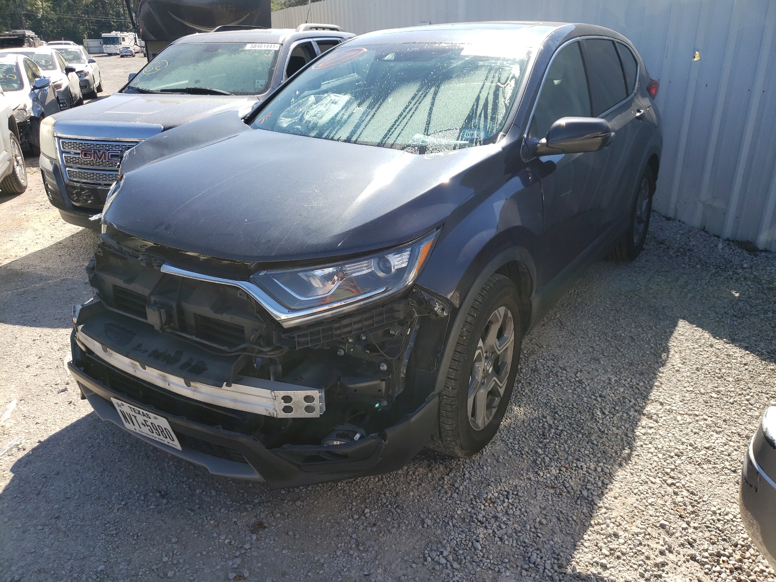 Photo 2 from auction – 2017 HONDA CR-V EXL with VIN 7FARW1H84HE011588