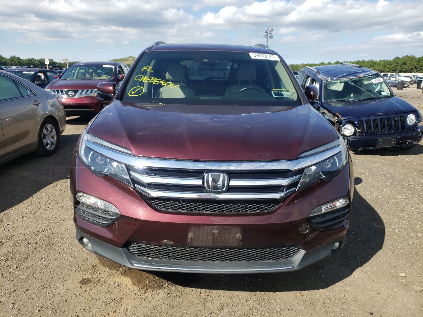 Photo 9 from auction – 2017 HONDA PILOT TOUR with VIN 5FNYF6H94HB039422