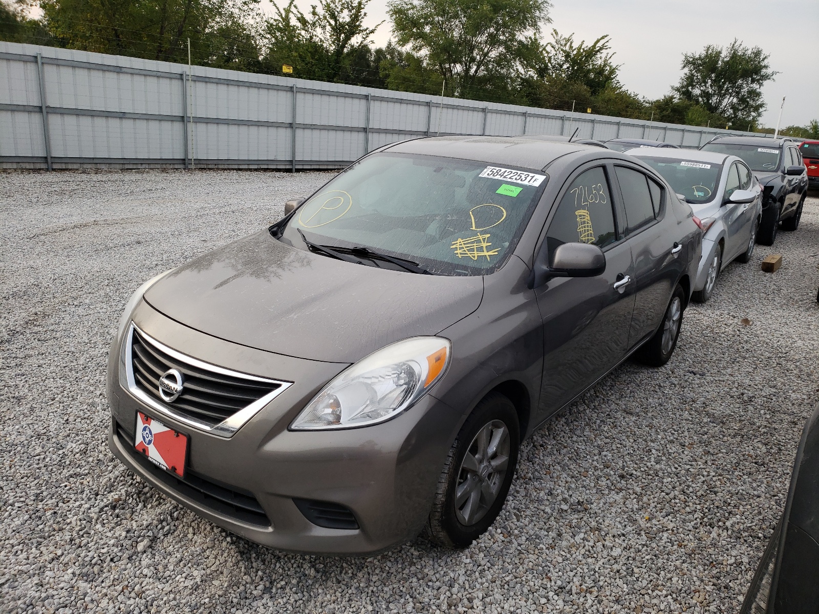 Photo 2 from auction – 2014 NISSAN VERSA S with VIN 3N1CN7AP4EL810070