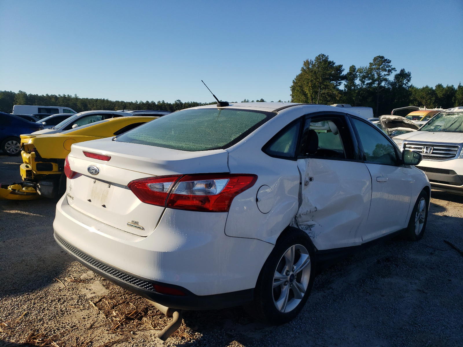 Photo 4 from auction – 2013 FORD FOCUS SE with VIN 1FADP3F21DL269500