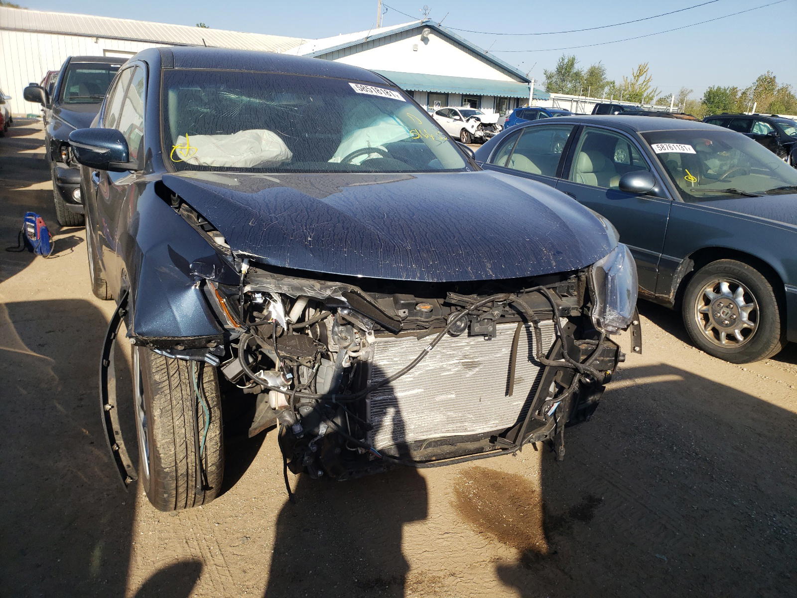 Photo 9 from auction – 2015 NISSAN ROGUE S with VIN KNMAT2MV6FP516635