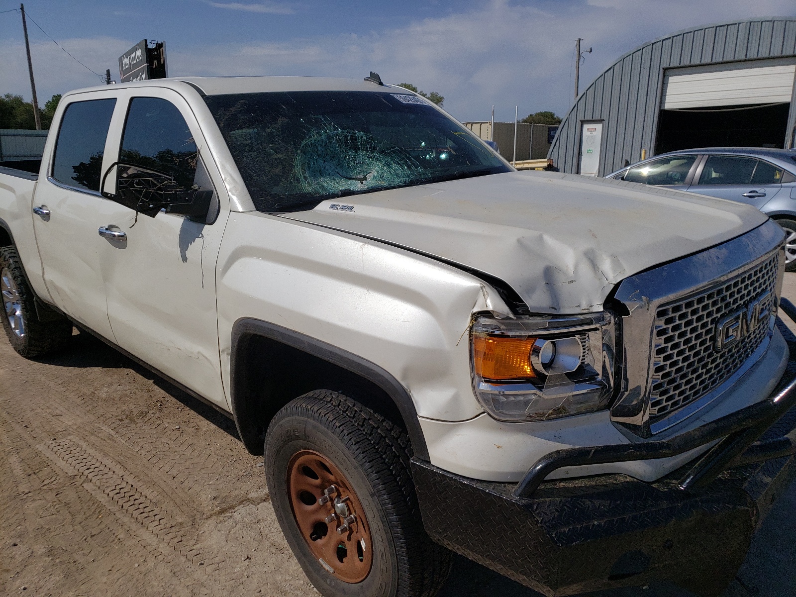 Photo 9 from auction – 2014 GMC SIERRA K15 with VIN 3GTU2WEJ3EG345218