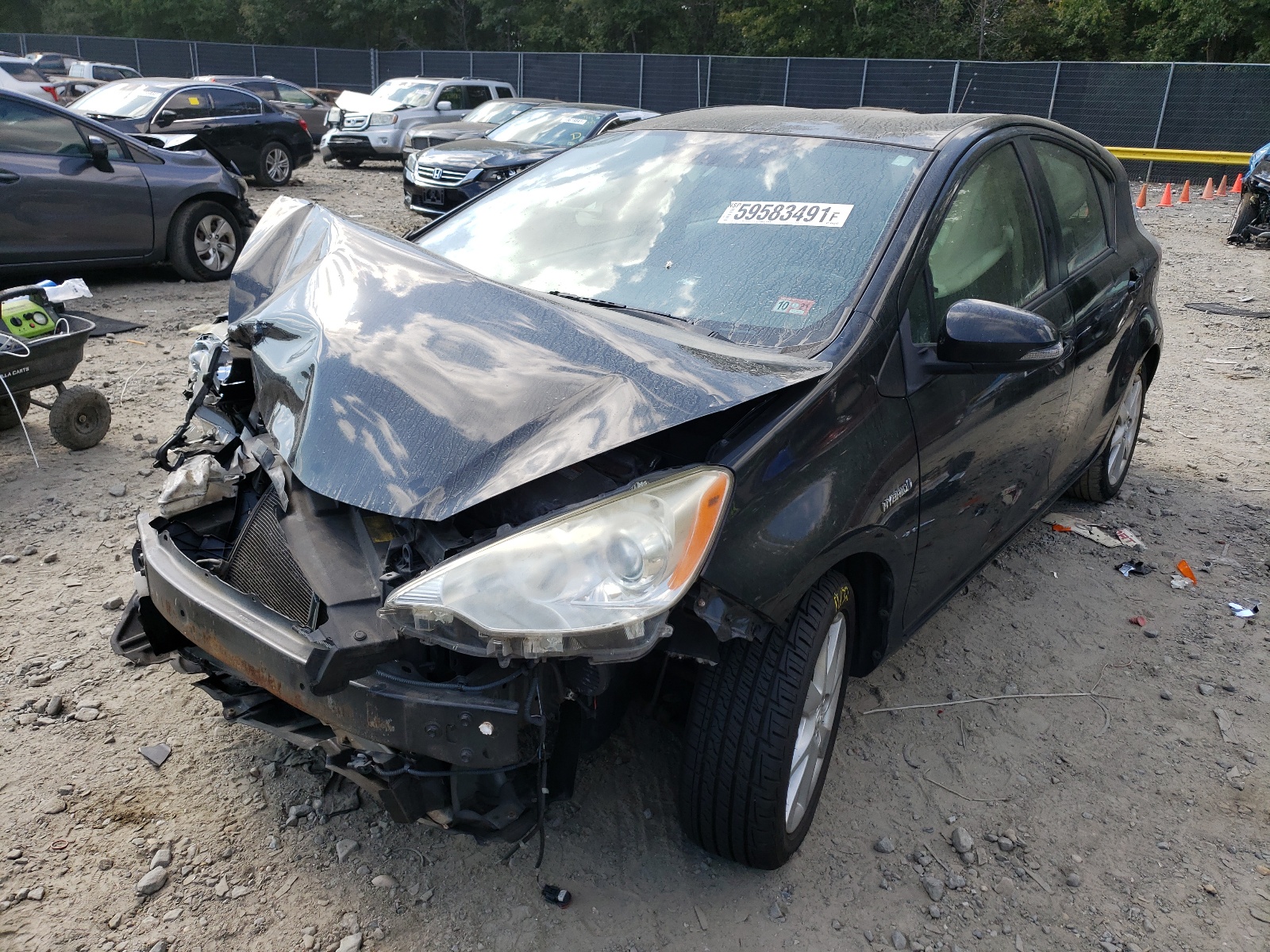 Photo 2 from auction – 2012 TOYOTA PRIUS C with VIN JTDKDTB36C1501608