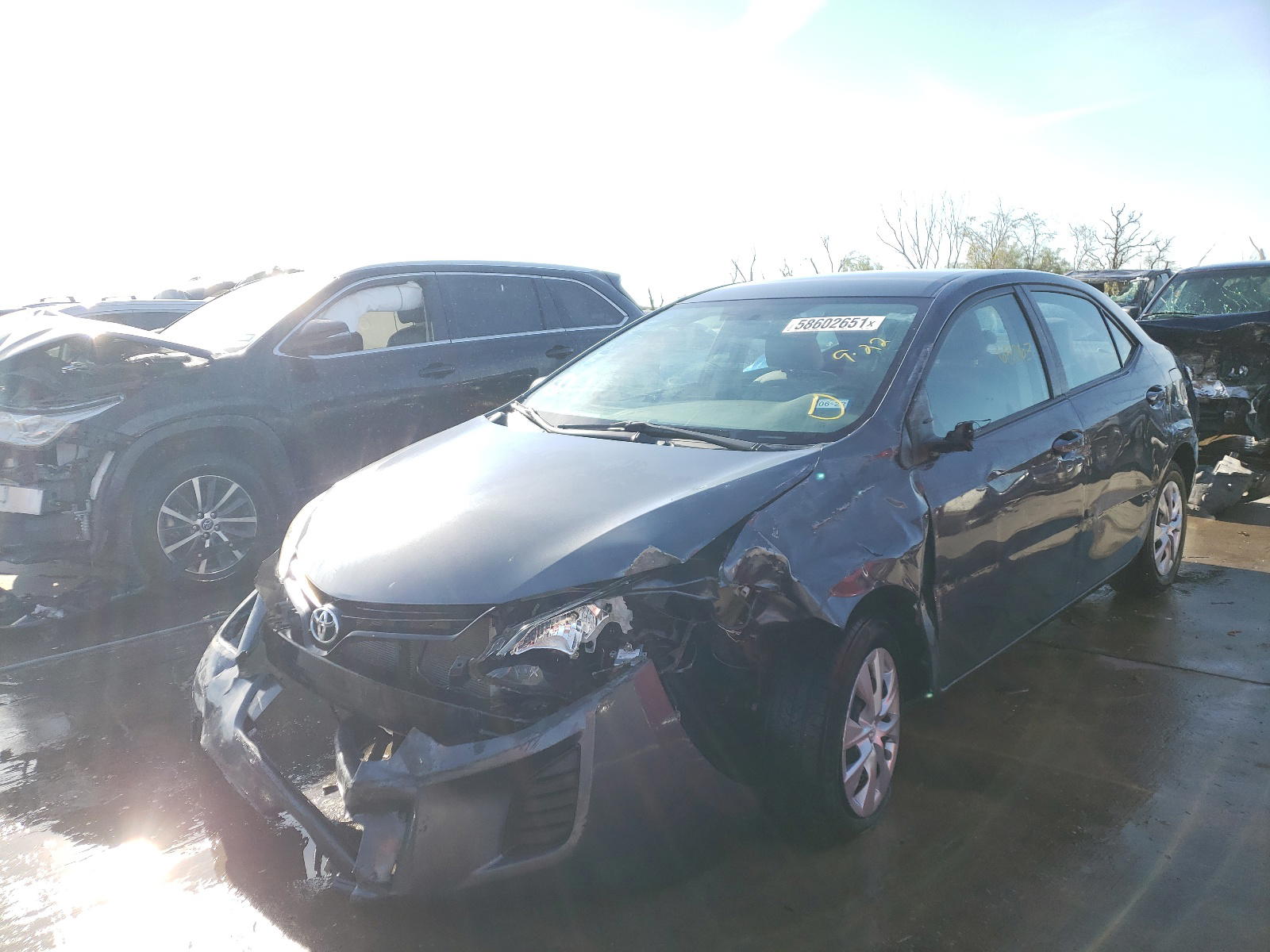 Photo 2 from auction – 2014 TOYOTA COROLLA EC with VIN 5YFBPRHE6EP119189
