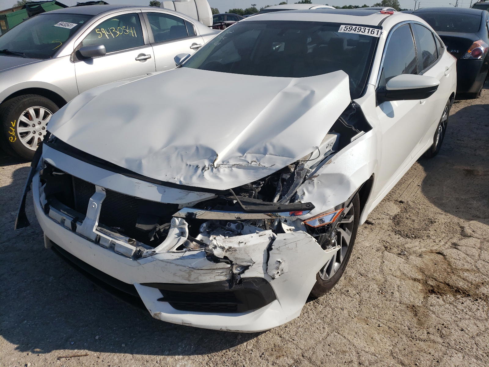 Photo 2 from auction – 2017 HONDA CIVIC EX with VIN 19XFC2F79HE004813