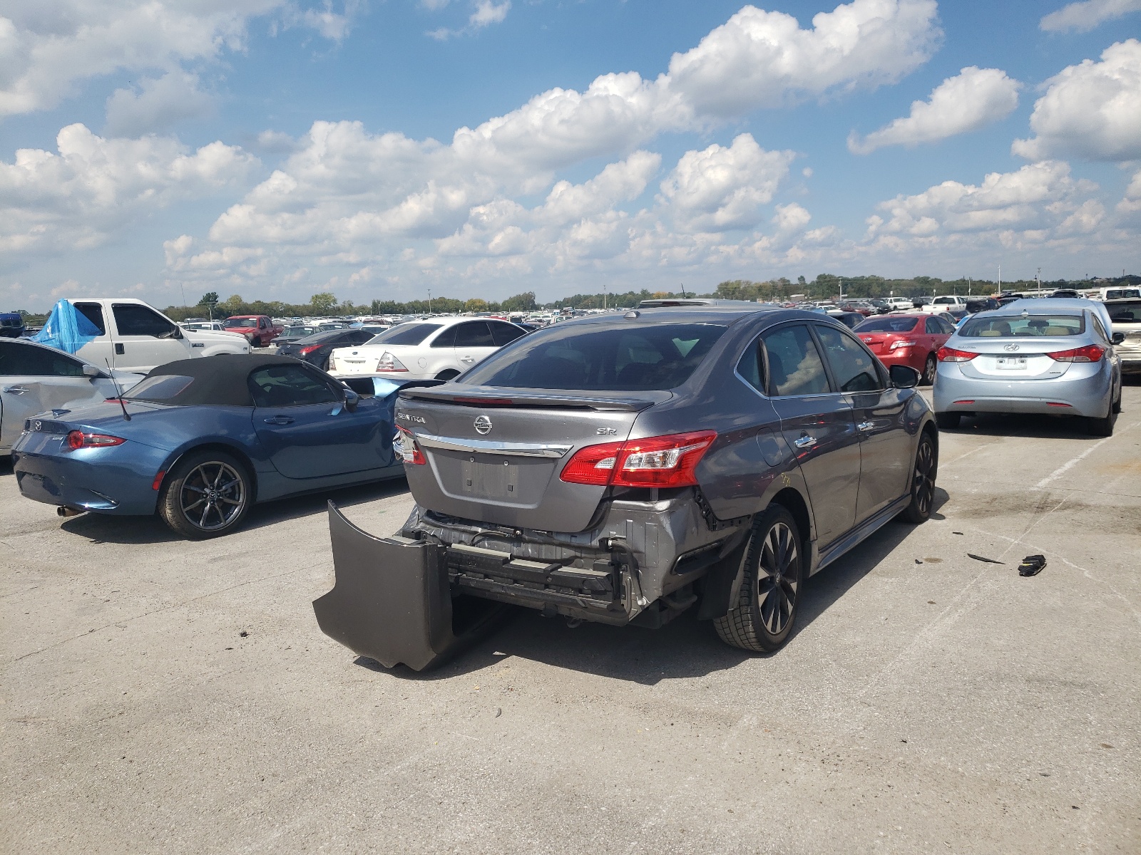 Photo 4 from auction – 2016 NISSAN SENTRA S with VIN 3N1AB7AP4GY315955