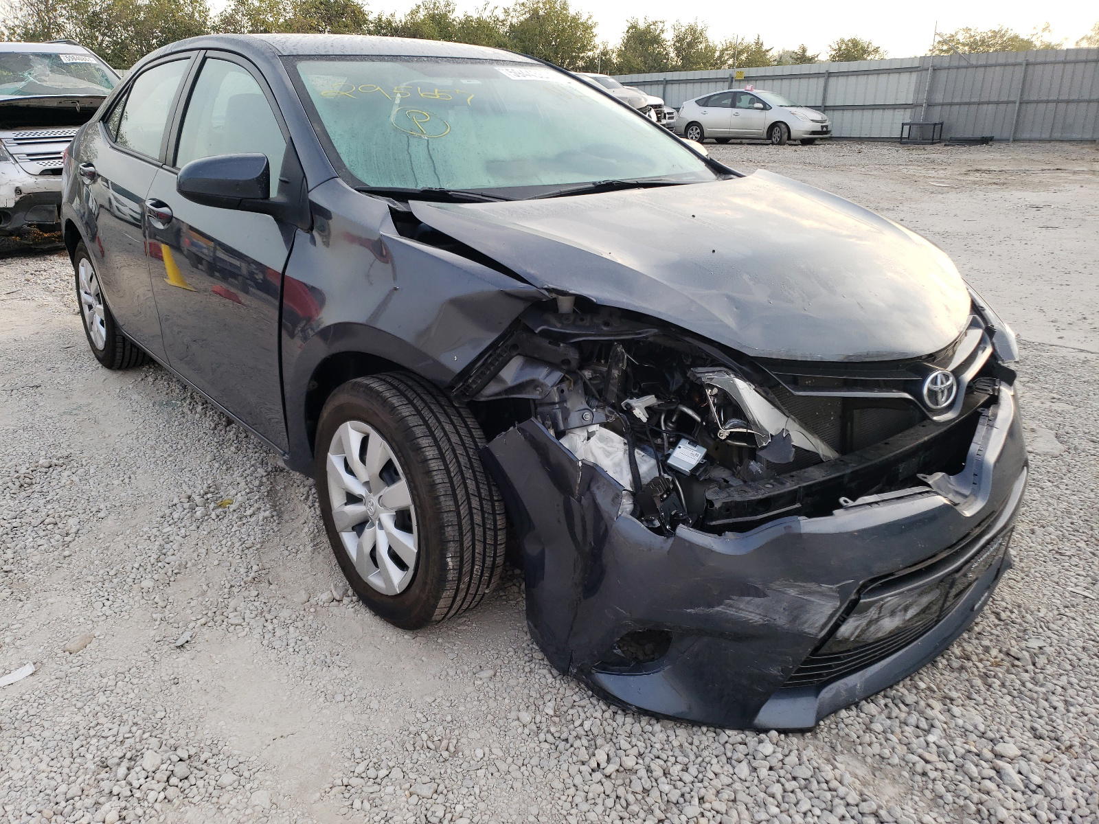 TOYOTA COROLLA L 2015 with VIN 5YFBURHE1FP295657 - Photo from auction