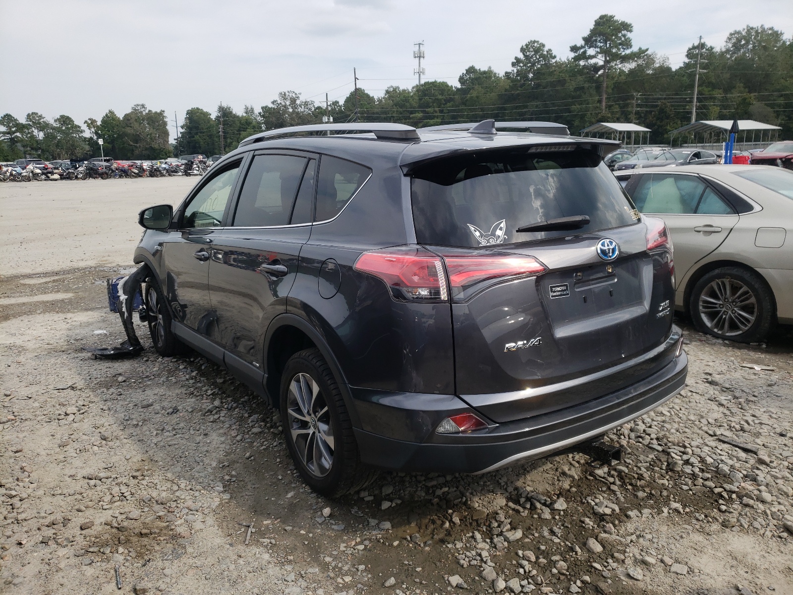Photo 3 from auction – 2017 TOYOTA RAV4 HV LE with VIN JTMRJREV5HD079649