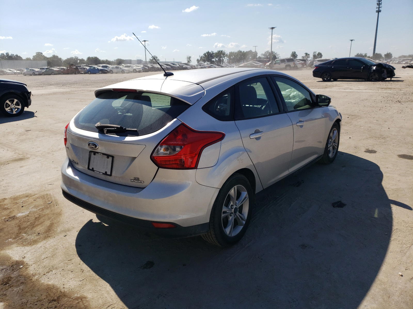 Photo 4 from auction – 2013 FORD FOCUS SE with VIN 1FADP3K27DL240976