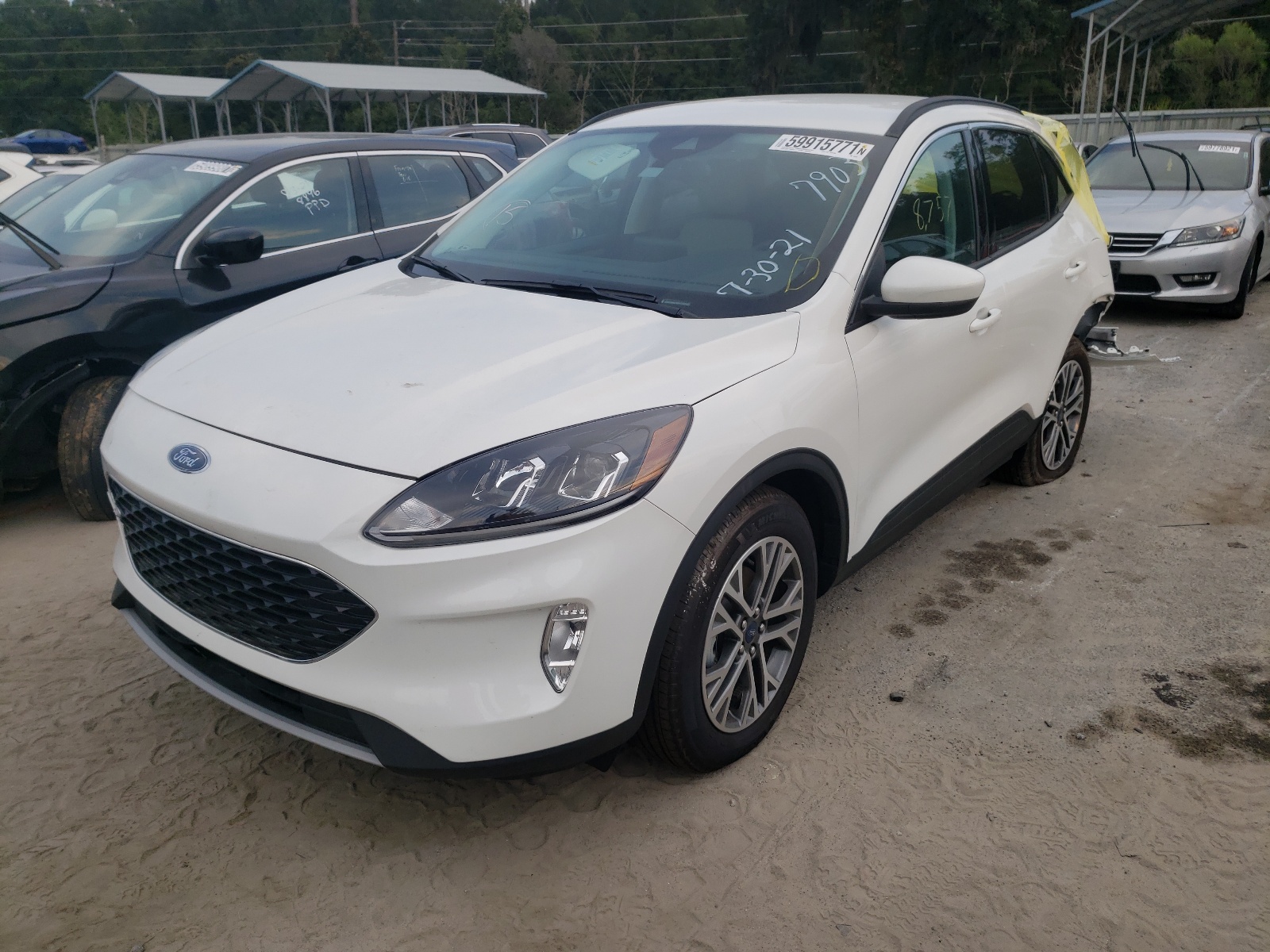 Photo 2 from auction – 2021 FORD ESCAPE SEL with VIN 1FMCU9H91MUA37903
