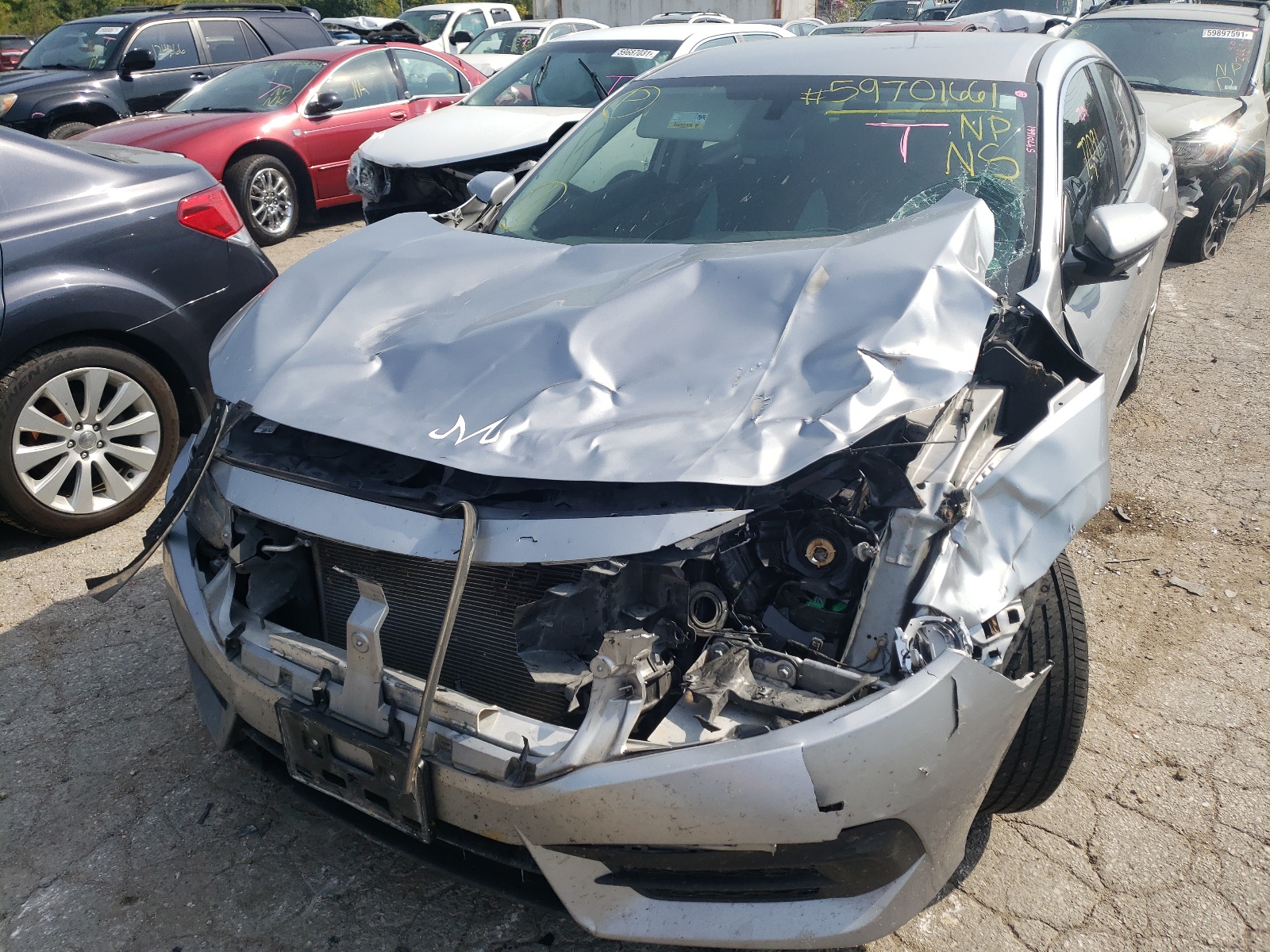 Photo 9 from auction – 2017 HONDA CIVIC LX with VIN 19XFC2F50HE015424