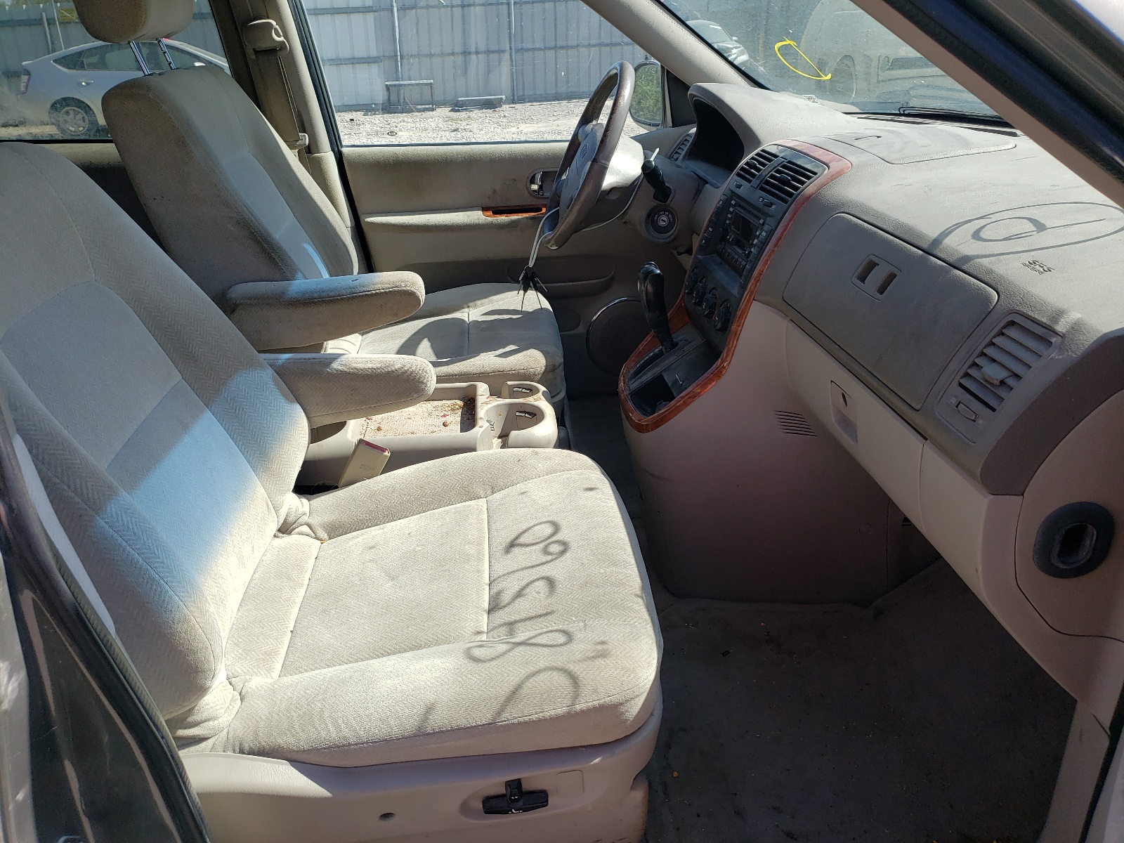 Photo 5 from auction – 2004 KIA SEDONA EX with VIN KNDUP131446584560
