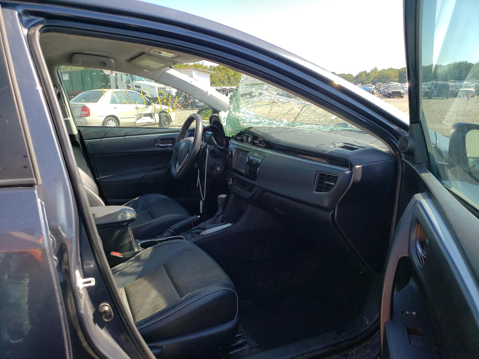 Photo 5 from auction – 2016 TOYOTA COROLLA L with VIN 5YFBURHE0GP405650