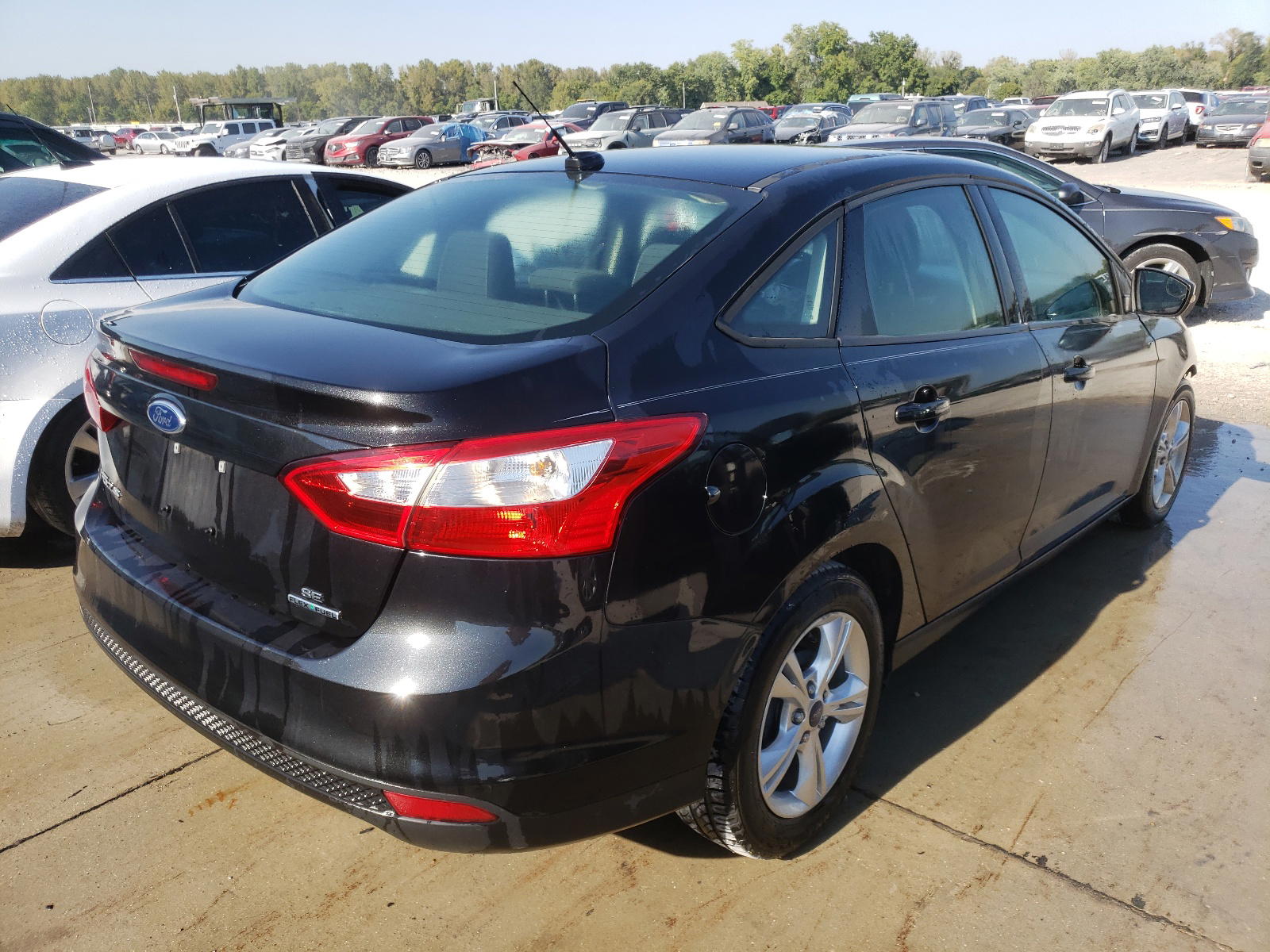 Photo 4 from auction – 2013 FORD FOCUS SE with VIN 1FADP3F21DL334412