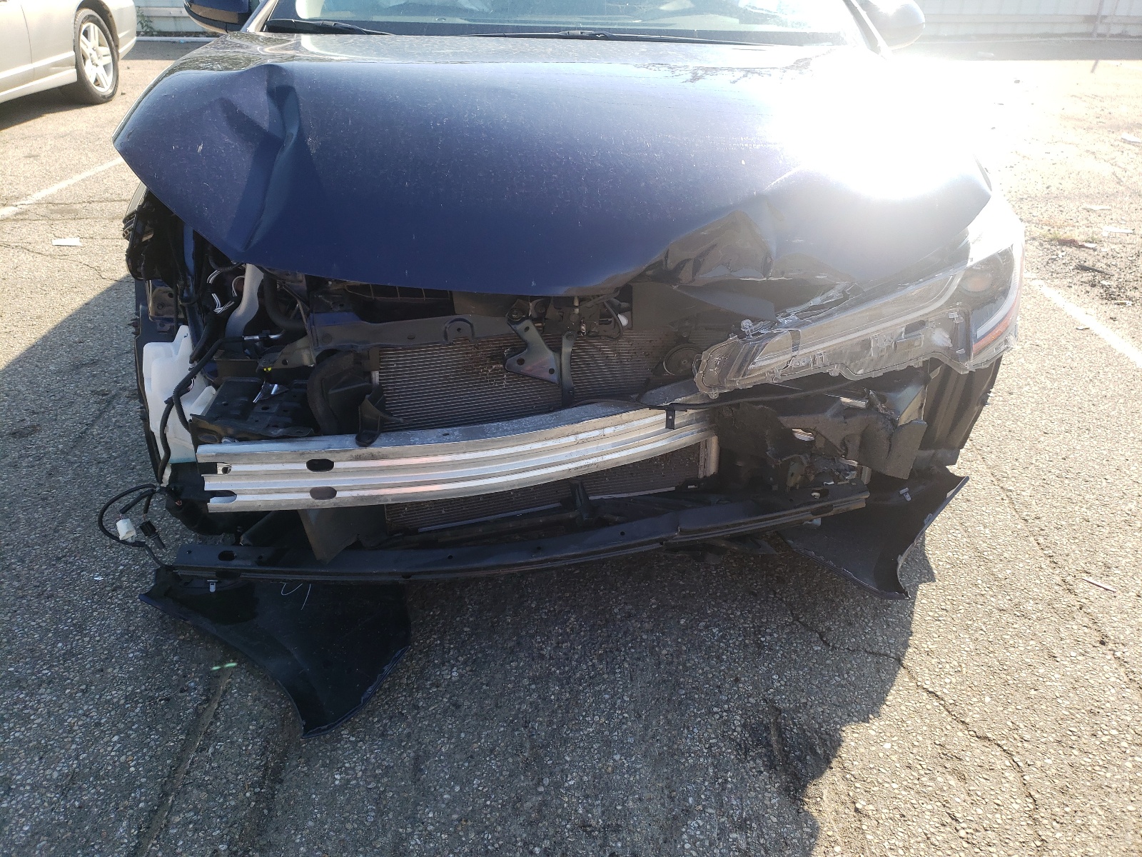 Photo 9 from auction – 2021 TOYOTA COROLLA LE with VIN JTDEPMAE4MJ141365