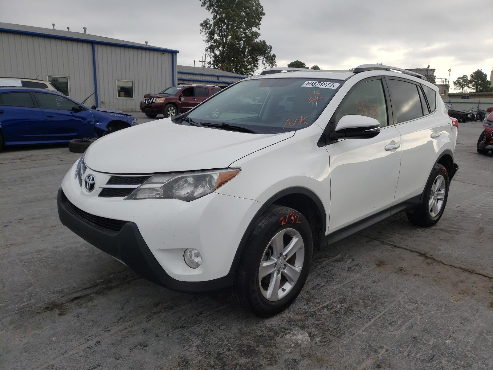 Photo 2 from auction – 2014 TOYOTA RAV4 XLE with VIN JTMWFREV0EJ007324