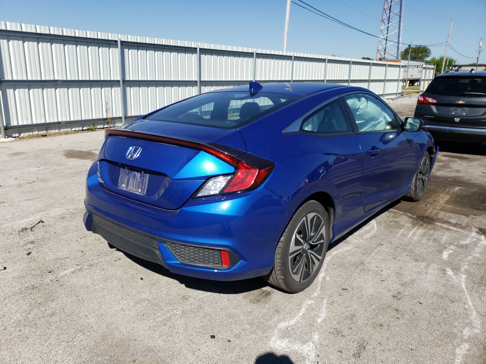 Photo 4 from auction – 2018 HONDA CIVIC EX with VIN 2HGFC3B36JH357210