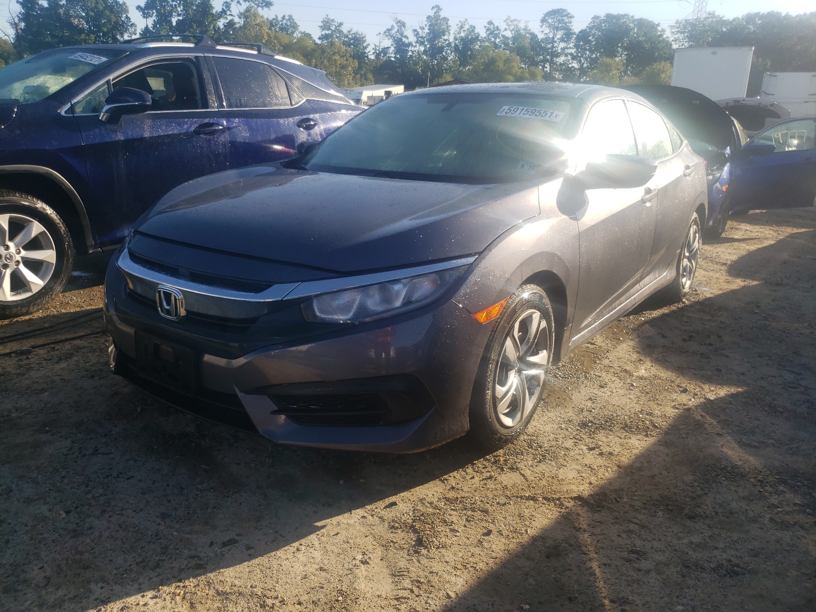 Photo 2 from auction – 2018 HONDA CIVIC LX with VIN 2HGFC2F55JH563740