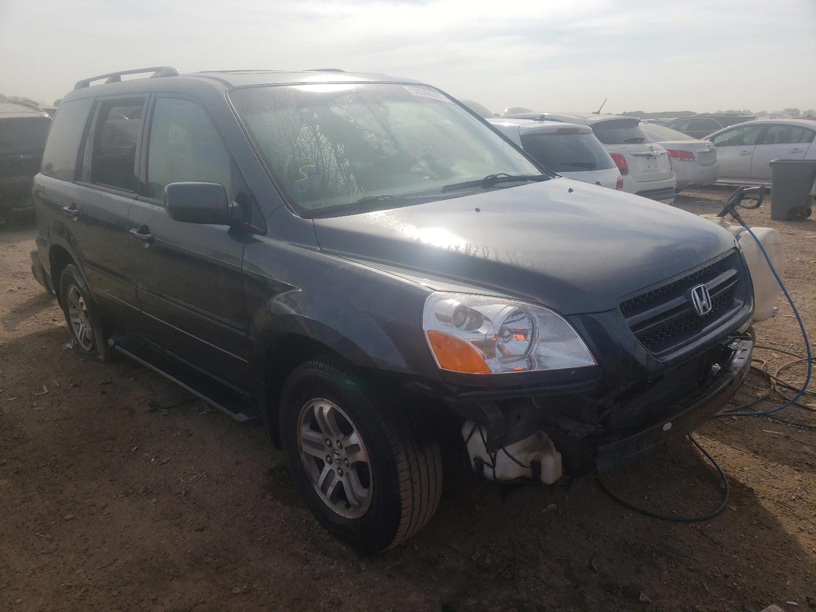 HONDA PILOT EXL 2003 with VIN 2HKYF18573H523725 - Photo from auction