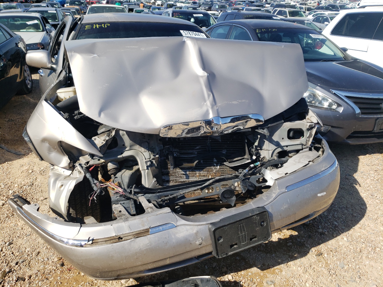 Photo 7 from auction – 1999 LINCOLN TOWN CAR E with VIN 1LNHM81W0XY690705