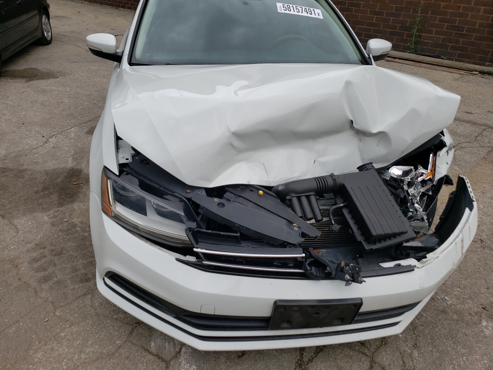 Photo 7 from auction – 2017 VOLKSWAGEN JETTA SE with VIN 3VWDB7AJ5HM200678