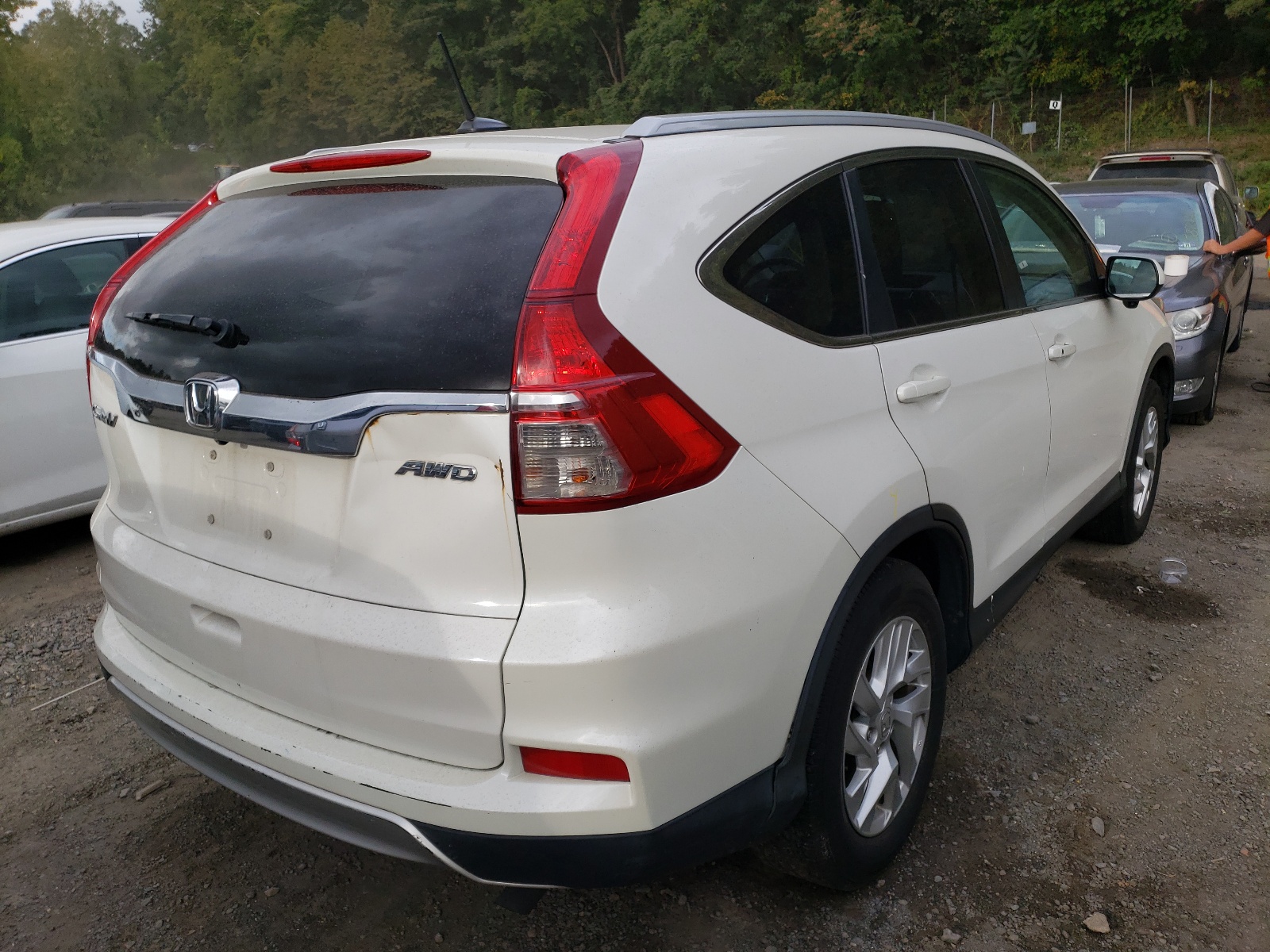Photo 4 from auction – 2015 HONDA CR-V EXL with VIN 5J6RM4H78FL043846