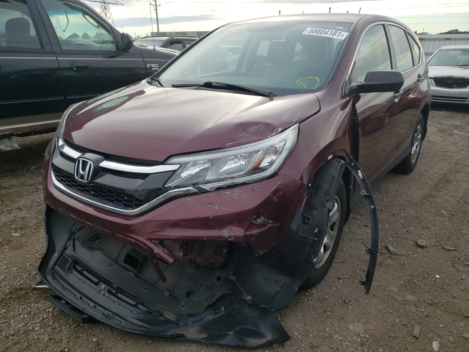 Photo 2 from auction – 2015 HONDA CR-V LX with VIN 5J6RM4H33FL046053