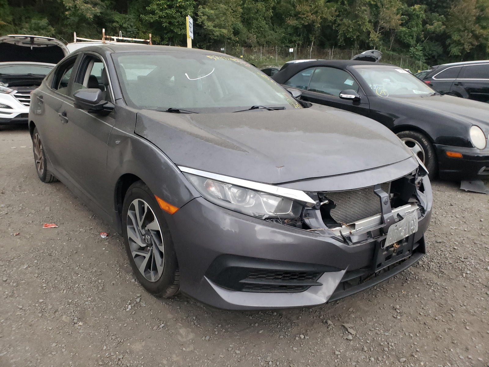 HONDA CIVIC EX 2016 with VIN 2HGFC2F75GH517318 - Photo from auction