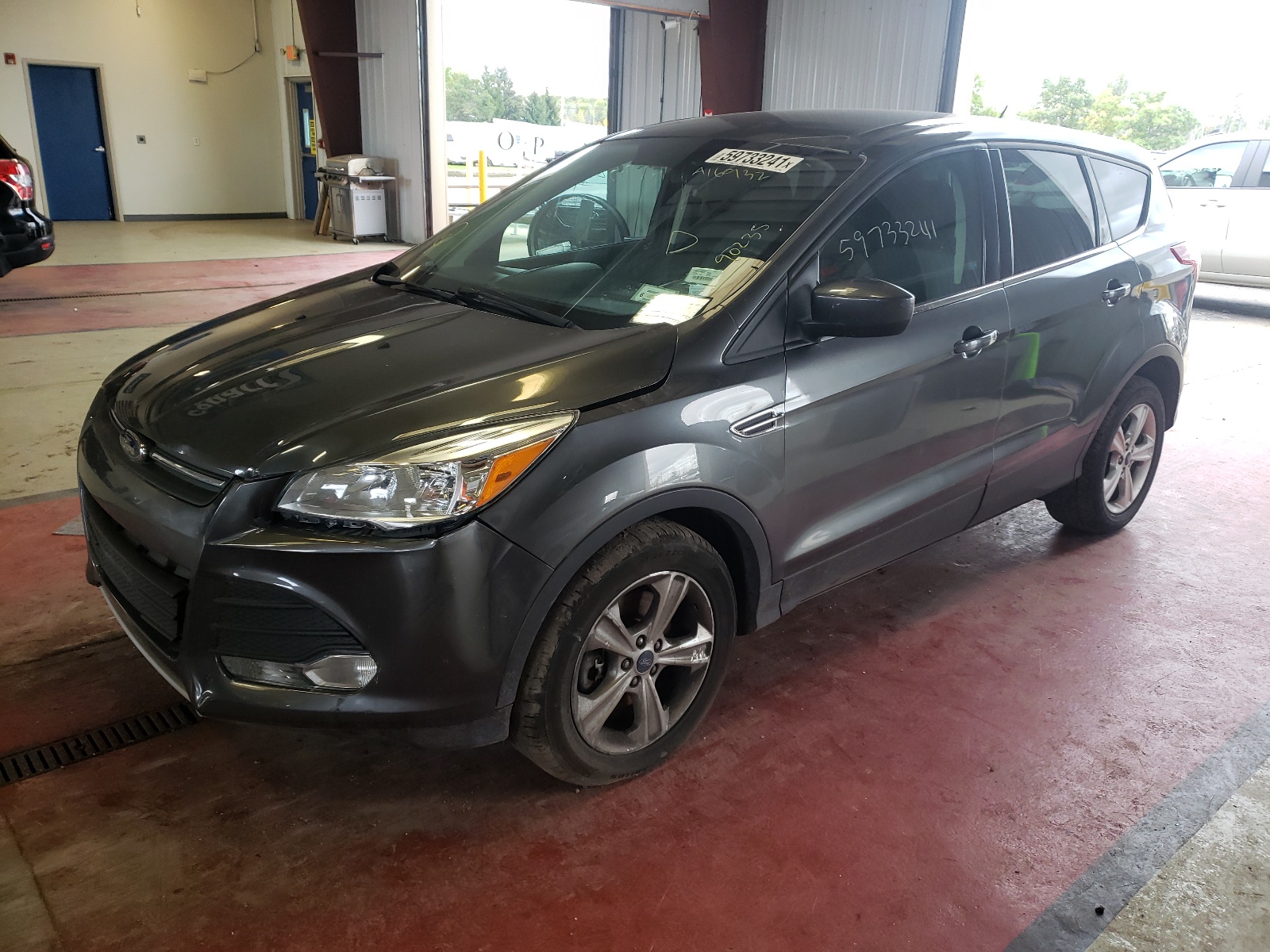 Photo 2 from auction – 2016 FORD ESCAPE SE with VIN 1FMCU9GX7GUA16932