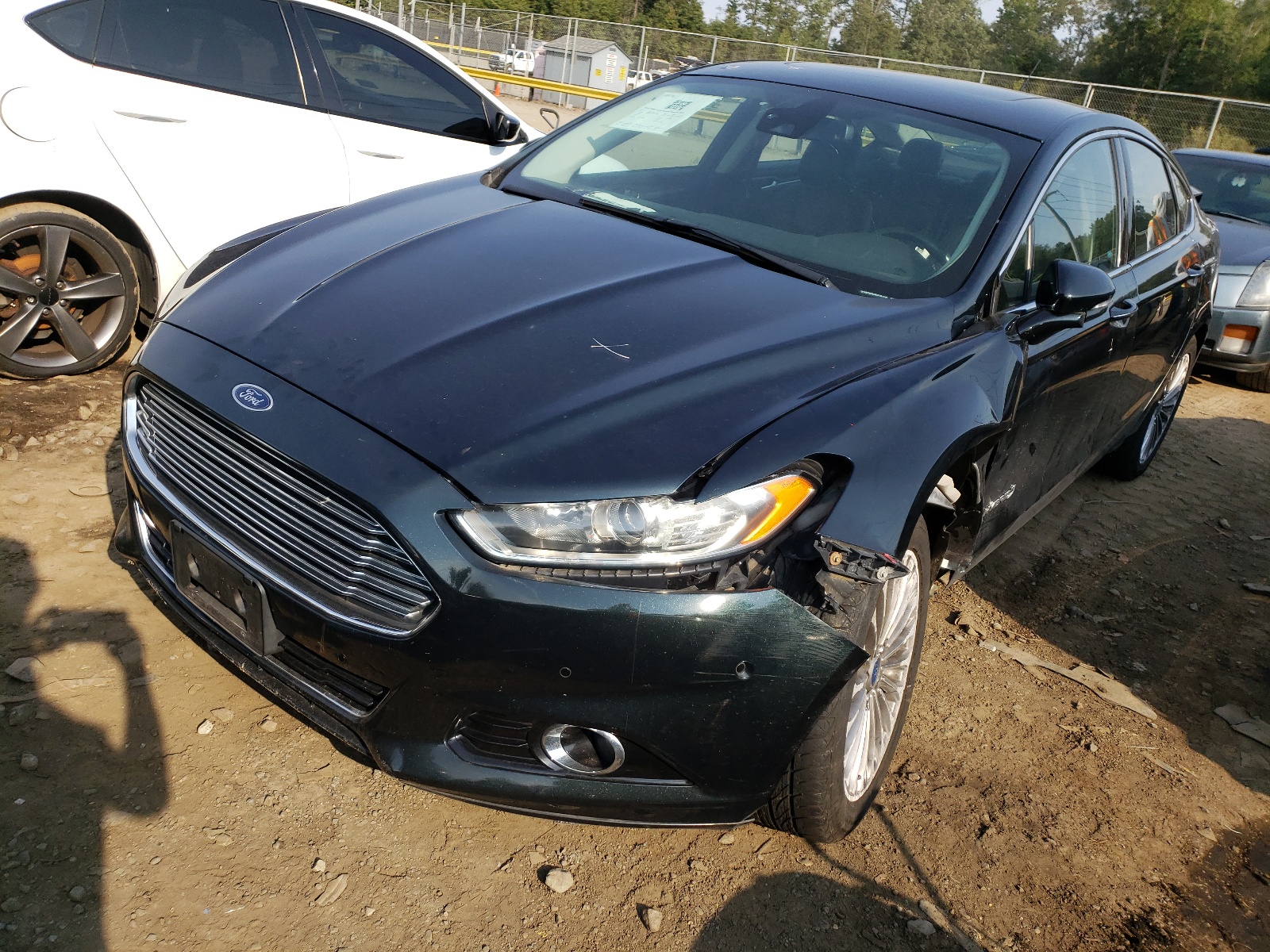 Photo 2 from auction – 2014 FORD FUSION TIT with VIN 3FA6P0RU3ER191101