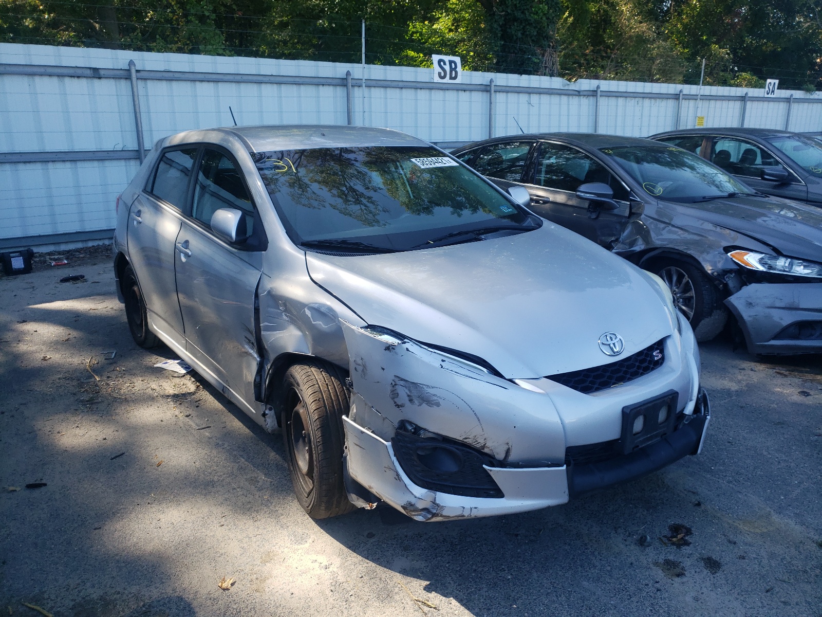 TOYOTA COROLLA MA 2009 with VIN 2T1KE40E49C030263 - Photo from auction