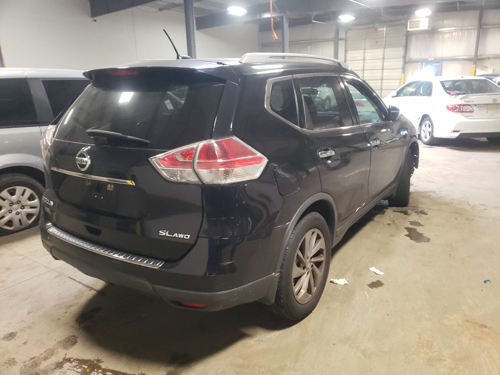 Photo 4 from auction – 2015 NISSAN ROGUE S with VIN 5N1AT2MV3FC818371