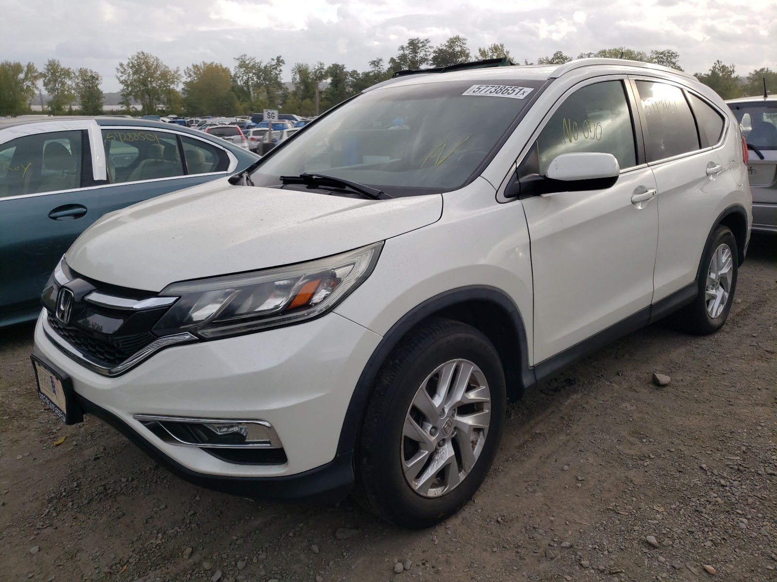 Photo 2 from auction – 2015 HONDA CR-V EXL with VIN 5J6RM4H78FL043846