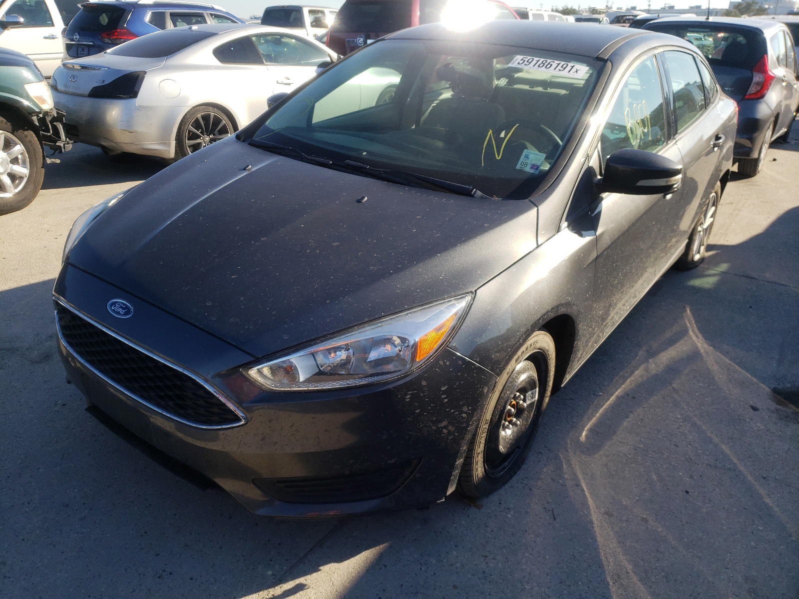 Photo 2 from auction – 2017 FORD FOCUS SE with VIN 1FADP3F23HL317326