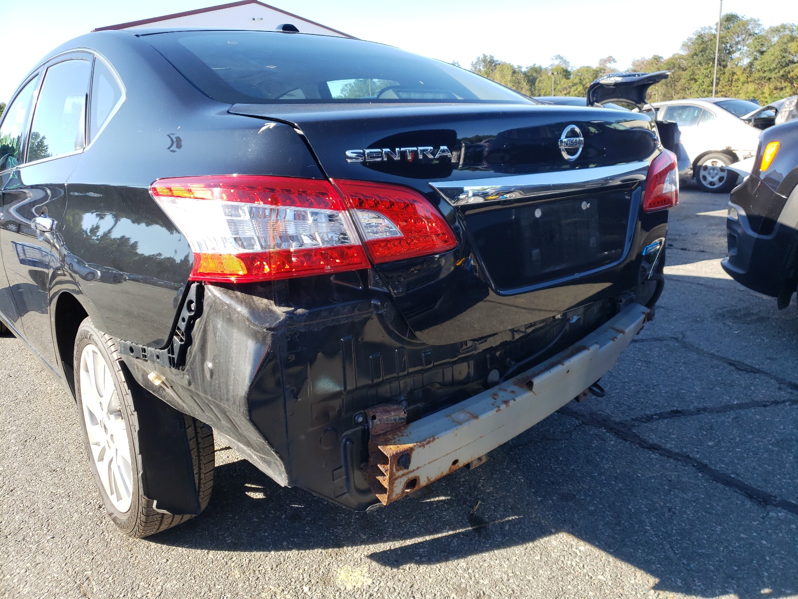 Photo 9 from auction – 2014 NISSAN SENTRA S with VIN 3N1AB7AP3EY203984