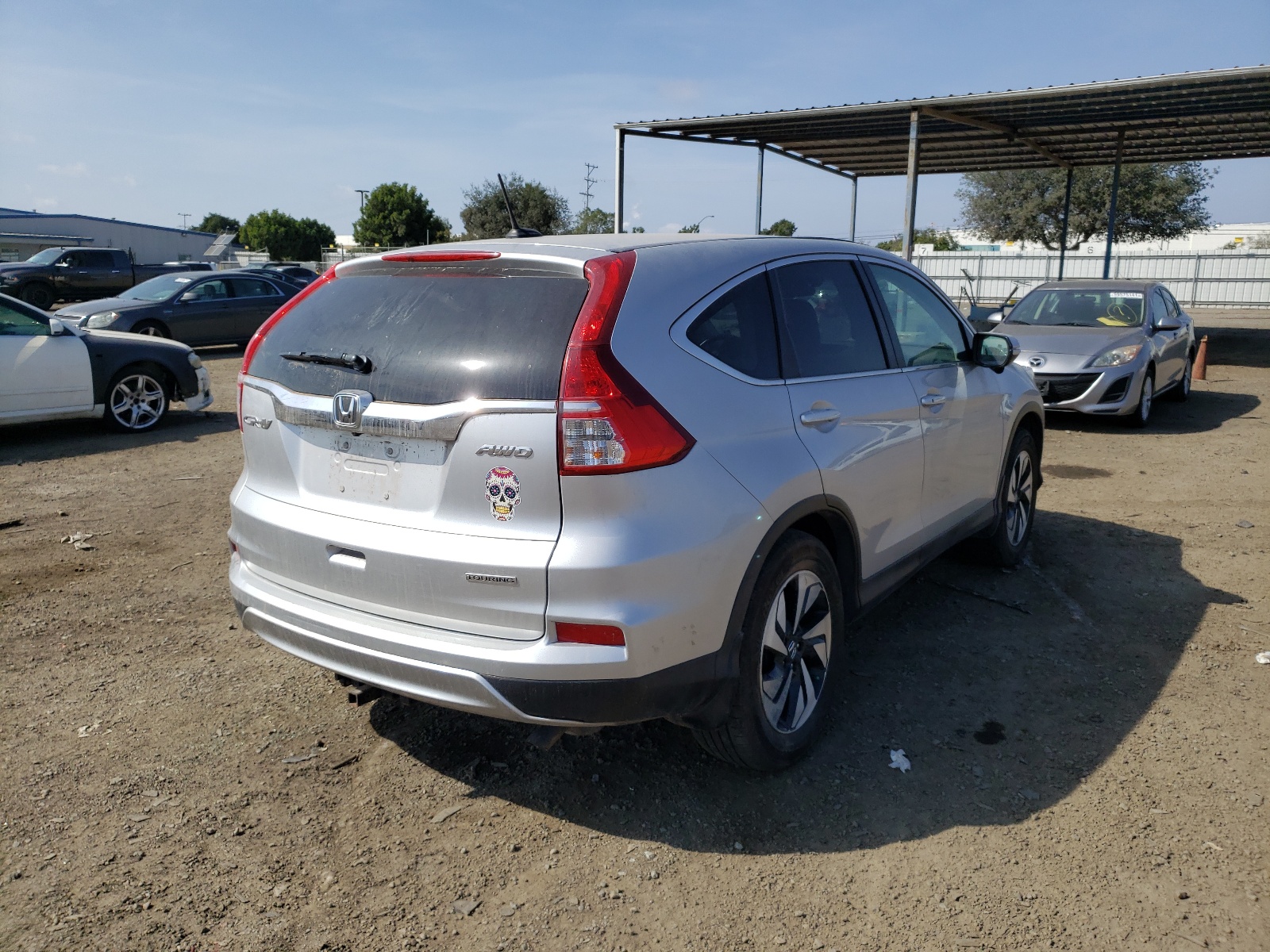 Photo 4 from auction – 2016 HONDA CR-V TOURI with VIN 5J6RM4H90GL087309