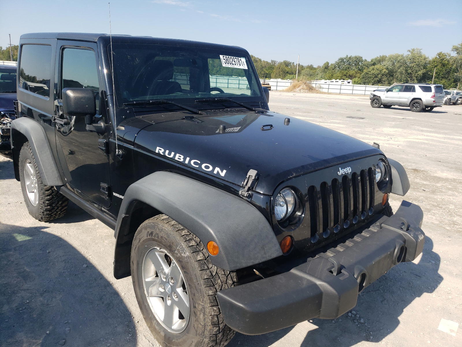JEEP WRANGLER R 2011 with VIN 1J4BA6D11BL502880 - Photo from auction