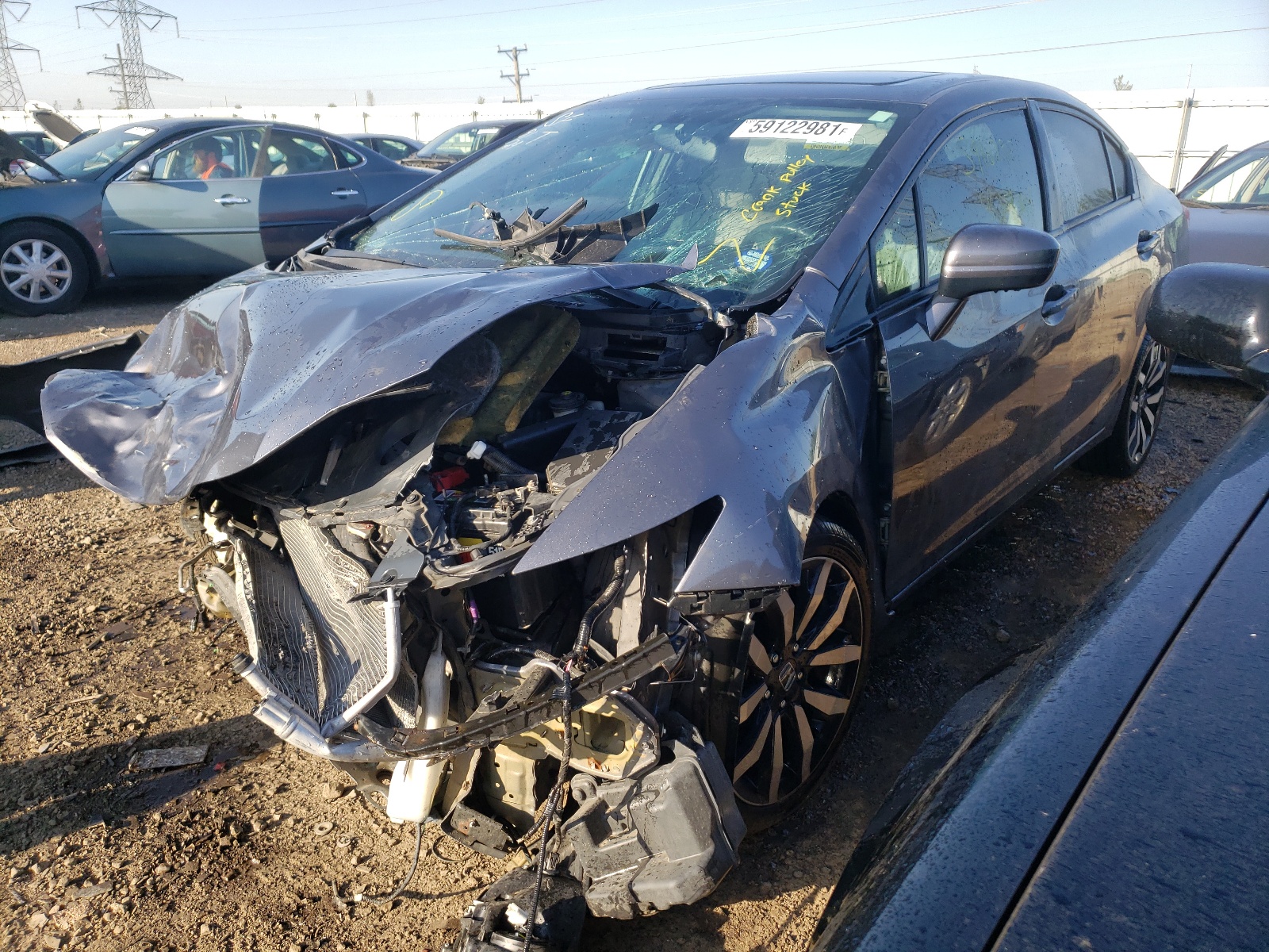 Photo 2 from auction – 2015 HONDA CIVIC EXL with VIN 2HGFB2F99FH544234