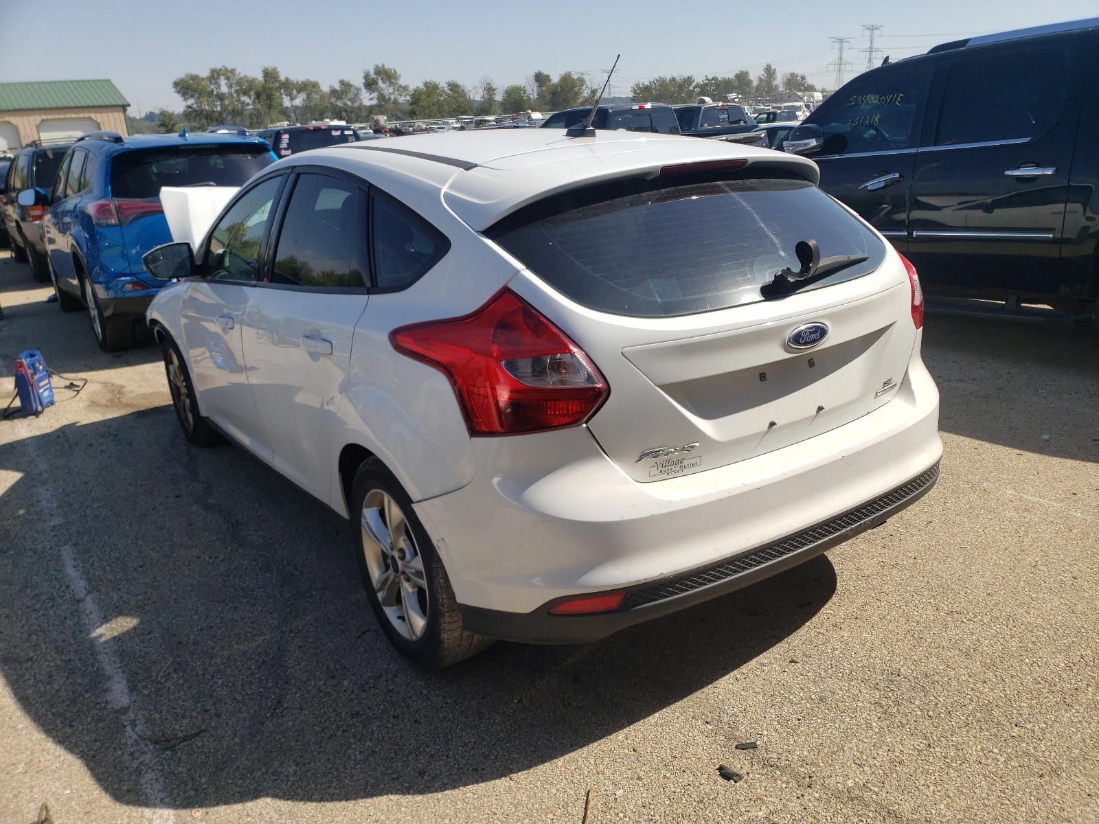 Photo 3 from auction – 2014 FORD FOCUS SE with VIN 1FADP3K28EL258419