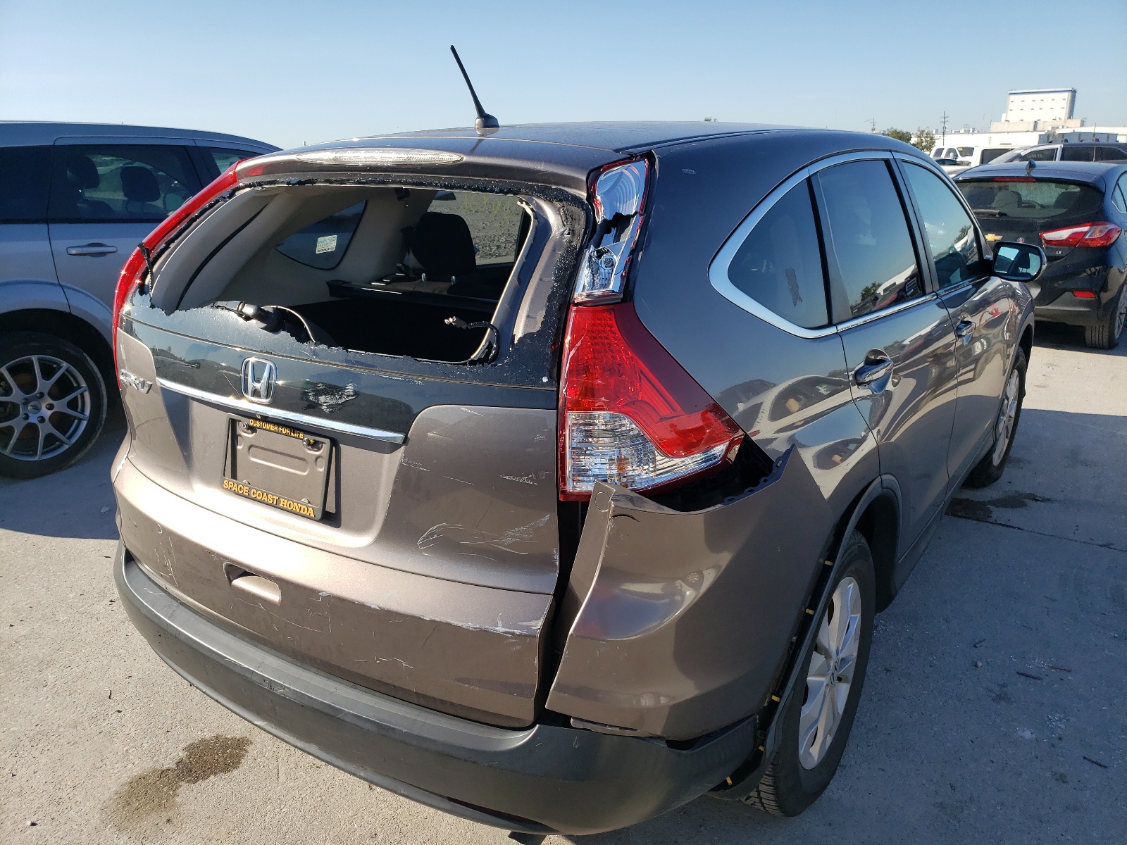 Photo 4 from auction – 2014 HONDA CR-V EX with VIN 3CZRM3H52EG702895