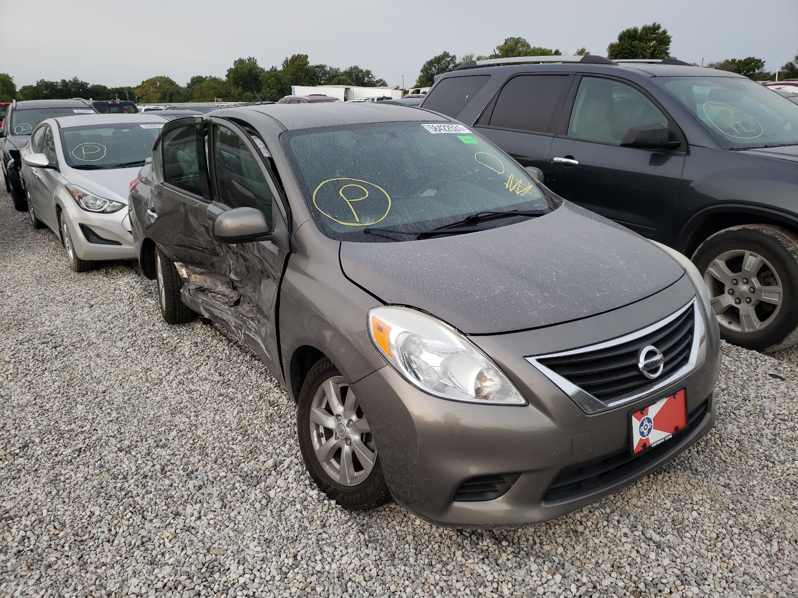 NISSAN VERSA S 2014 with VIN 3N1CN7AP4EL810070 - Photo from auction