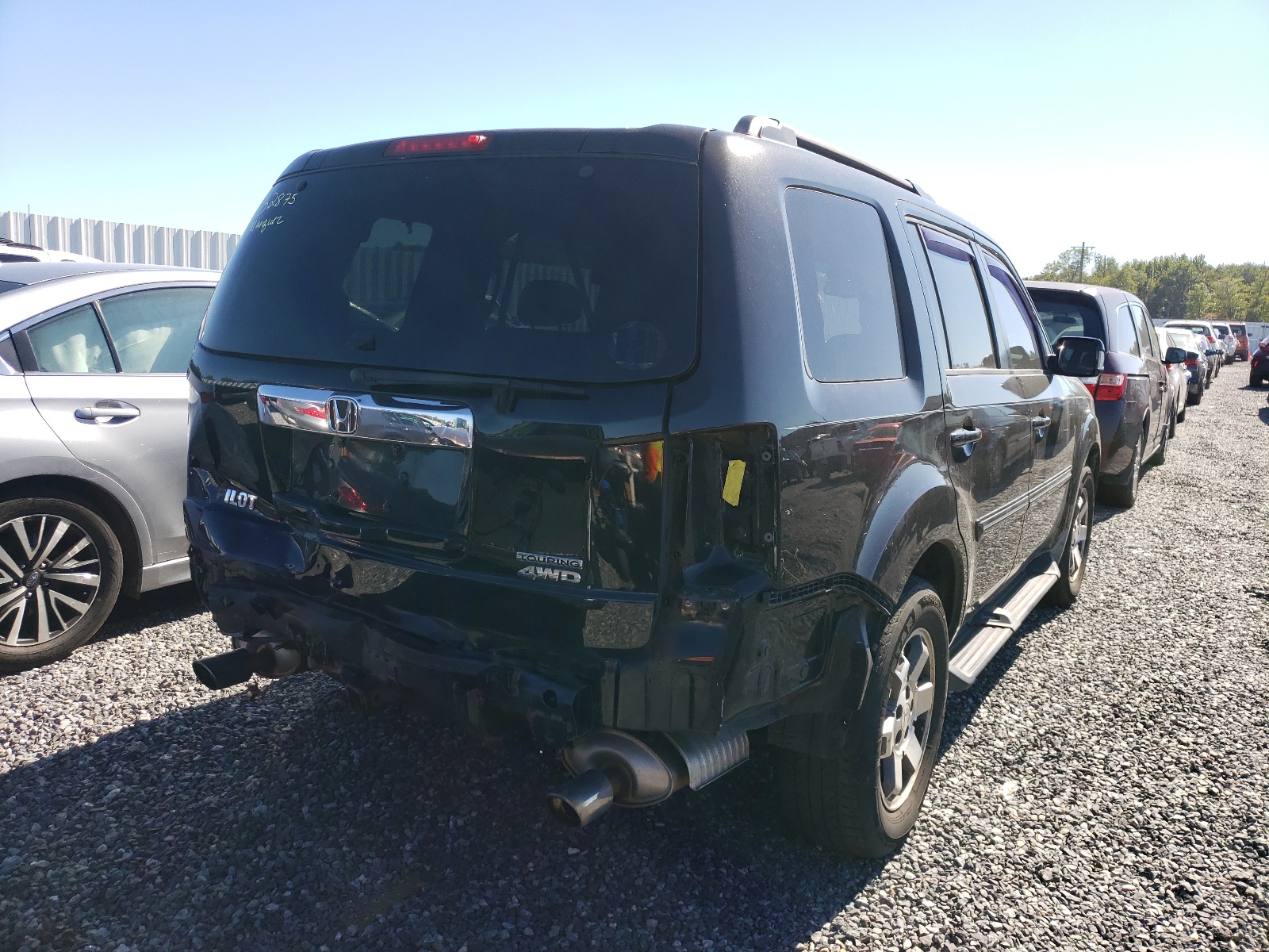 Photo 4 from auction – 2010 HONDA PILOT TOUR with VIN 5FNYF4H81AB012311