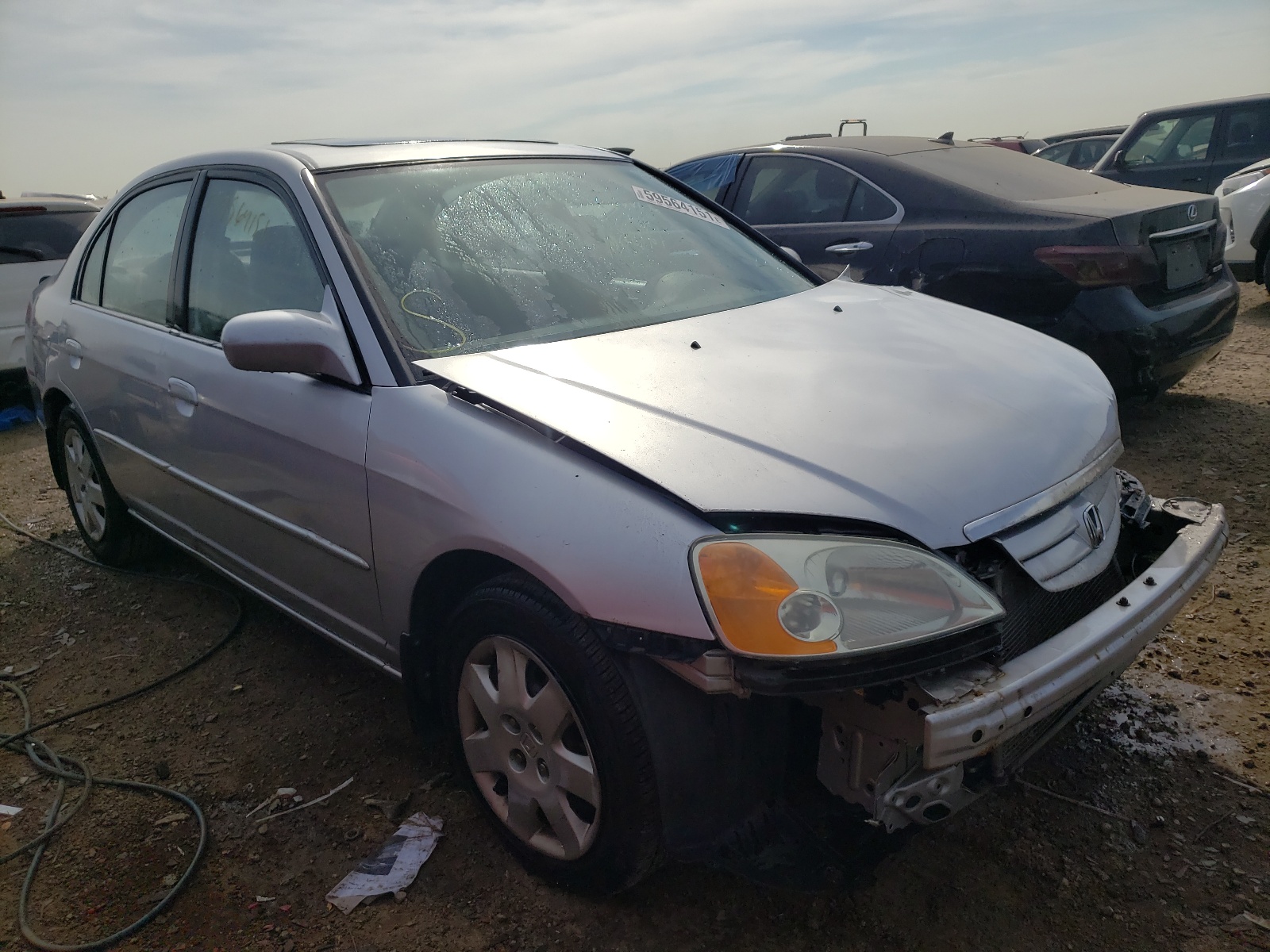 HONDA CIVIC EX 2002 with VIN 1HGES26712L027369 - Photo from auction